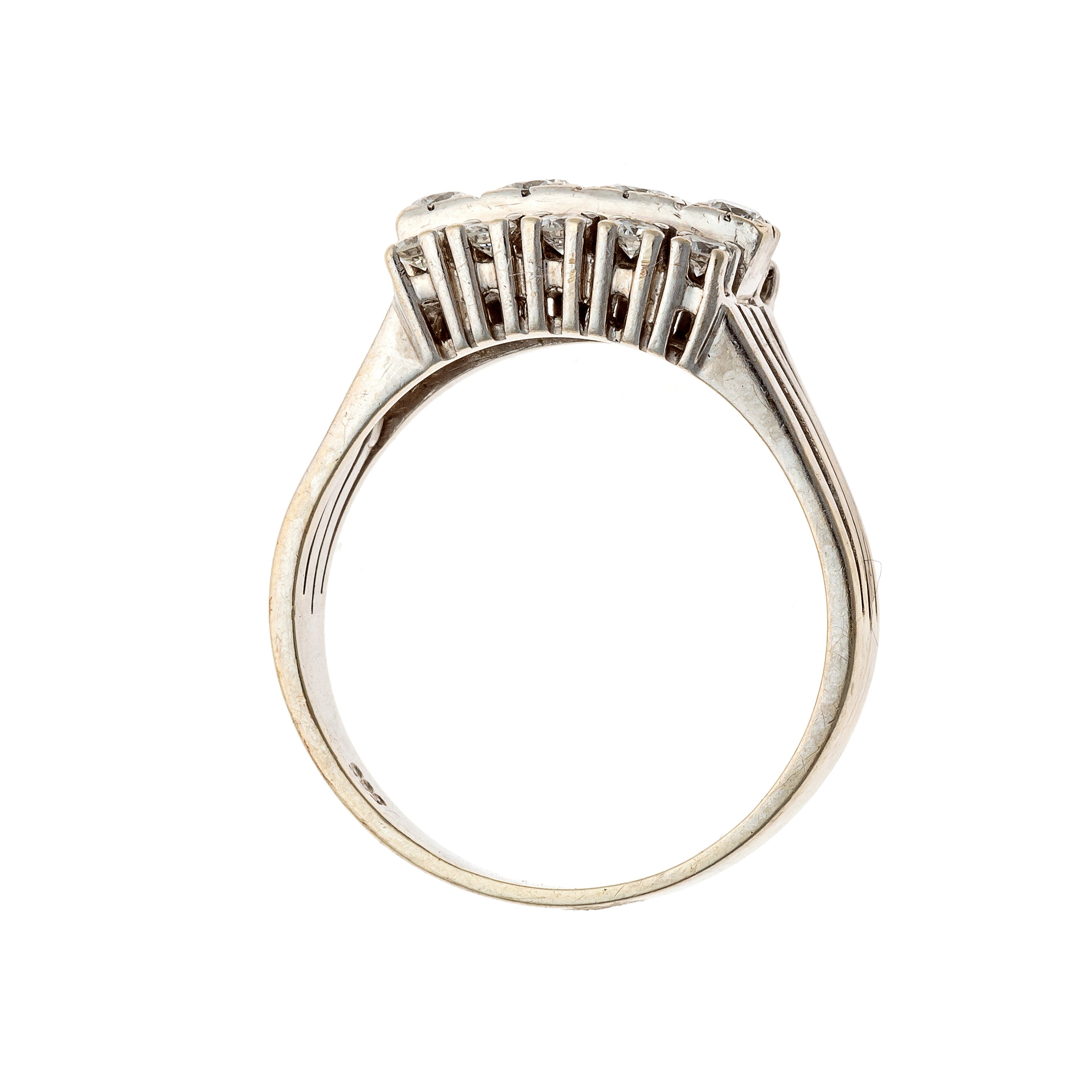 Profile of the vintage Mid-Century white gold triple row diamond cocktail ring.