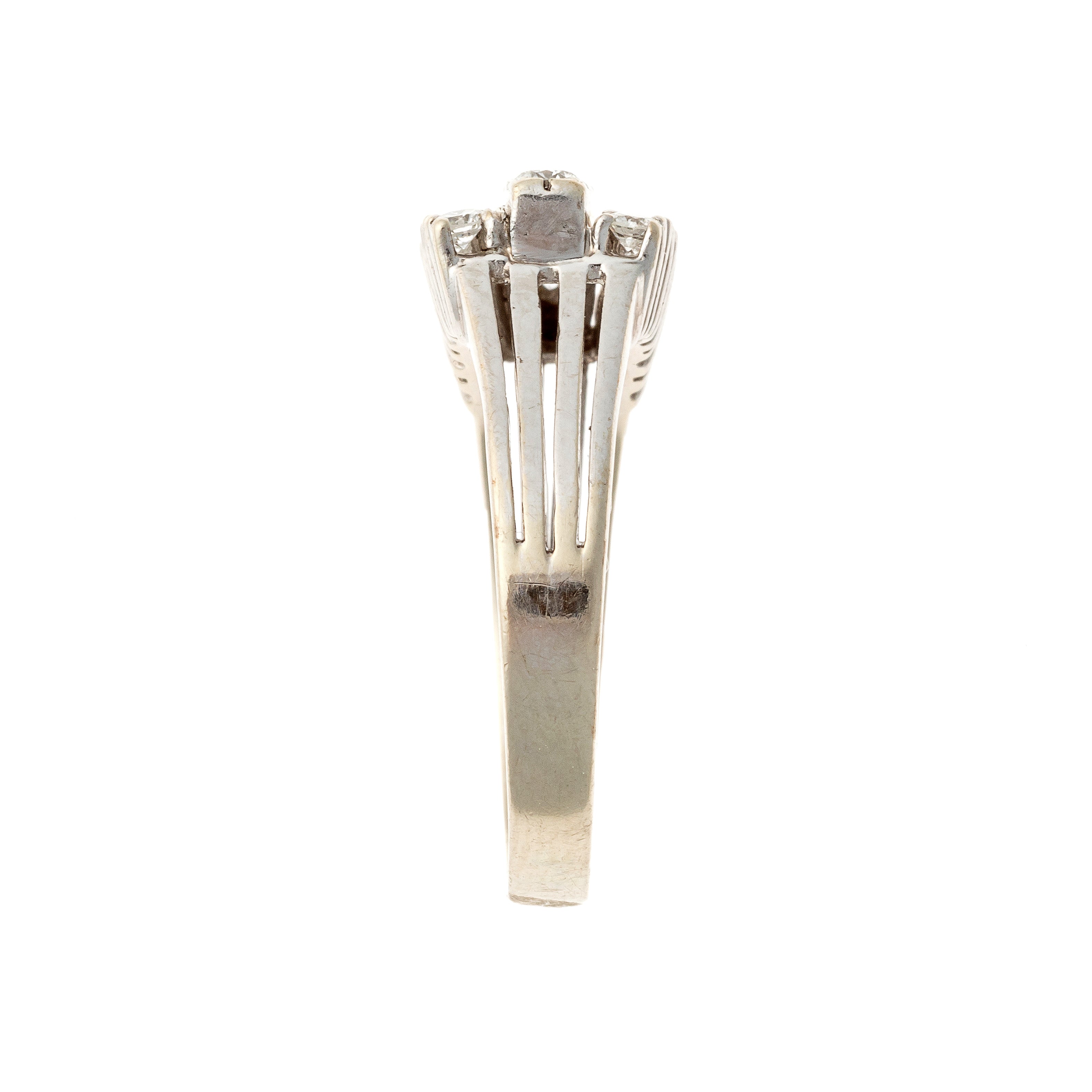 Side view of the vintage Mid-Century white gold triple row diamond cocktail ring.