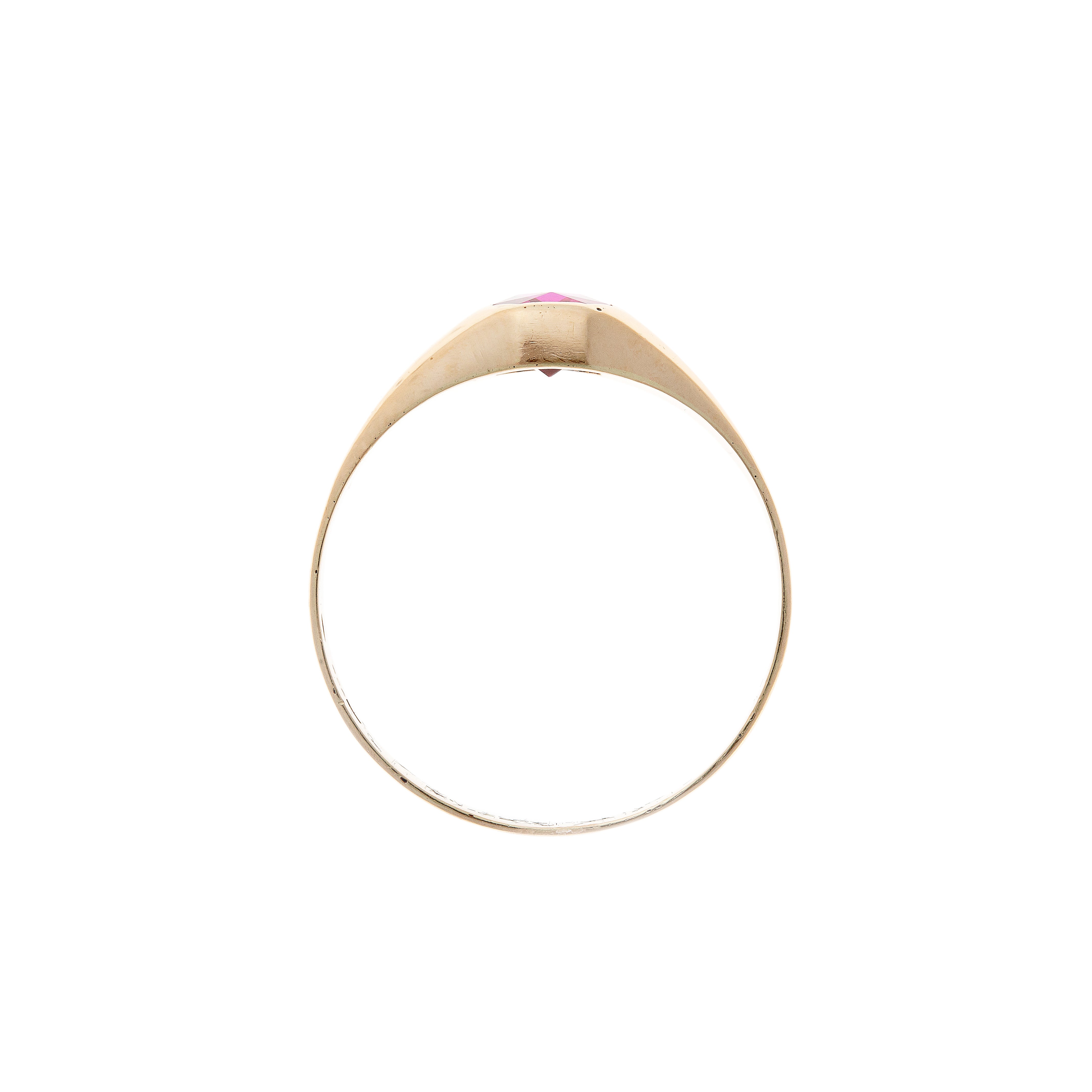 Side profile of a German-made 14K gold signet ring with a striking synthetic ruby centerpiece.