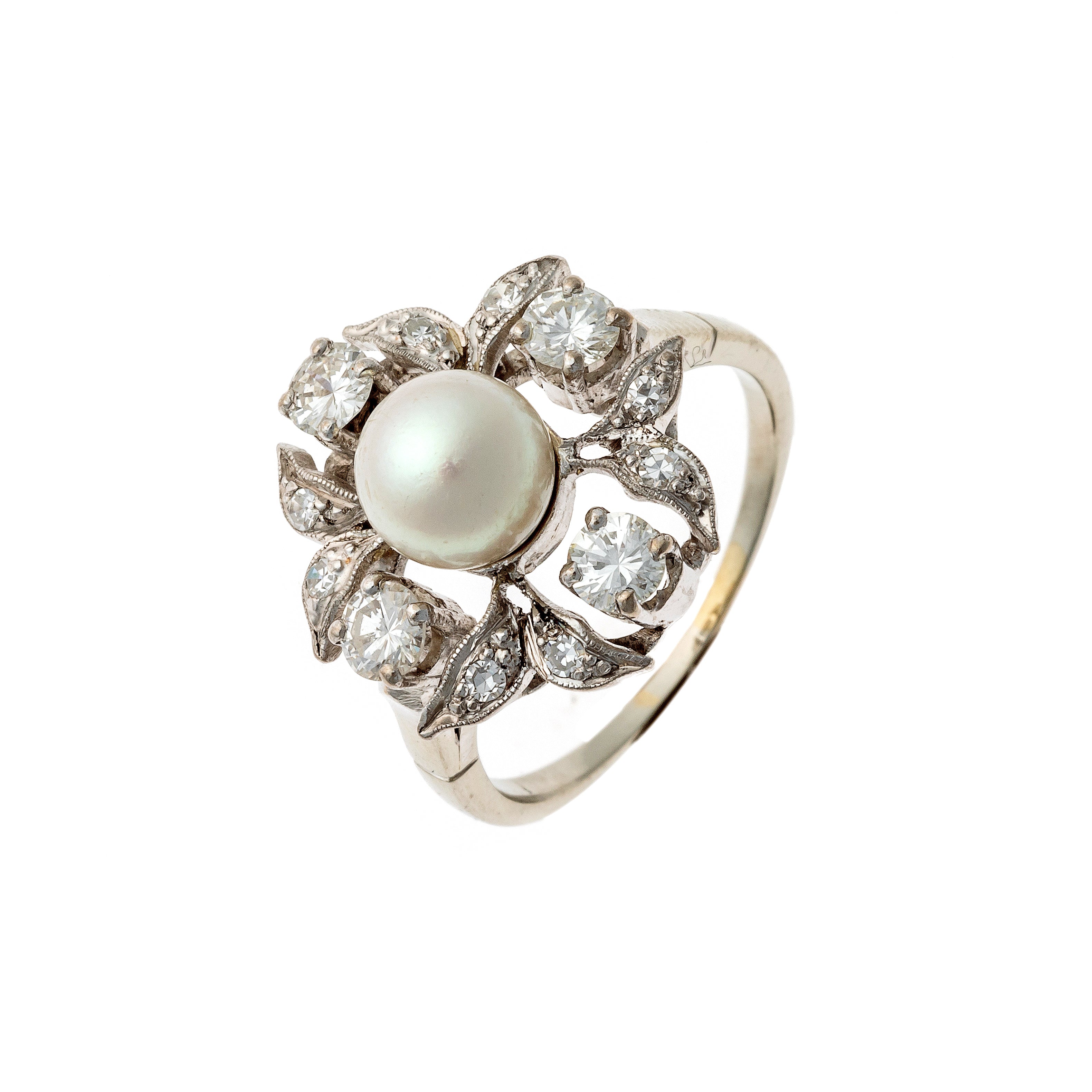Vintage mid-century white gold floral ring with pearl center and diamond petals.