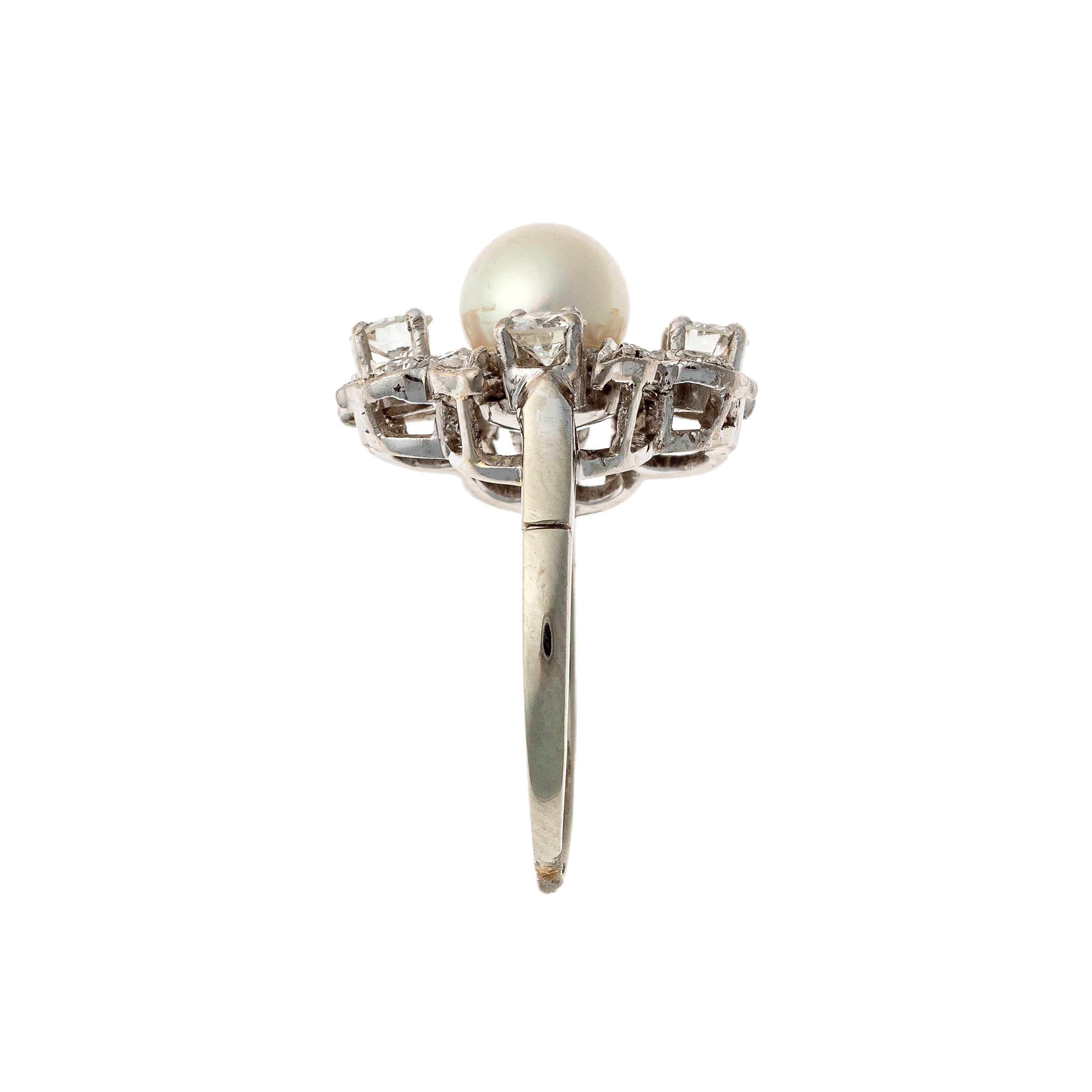 Side of the mid-century white gold floral ring with pearl center and diamond petals.
