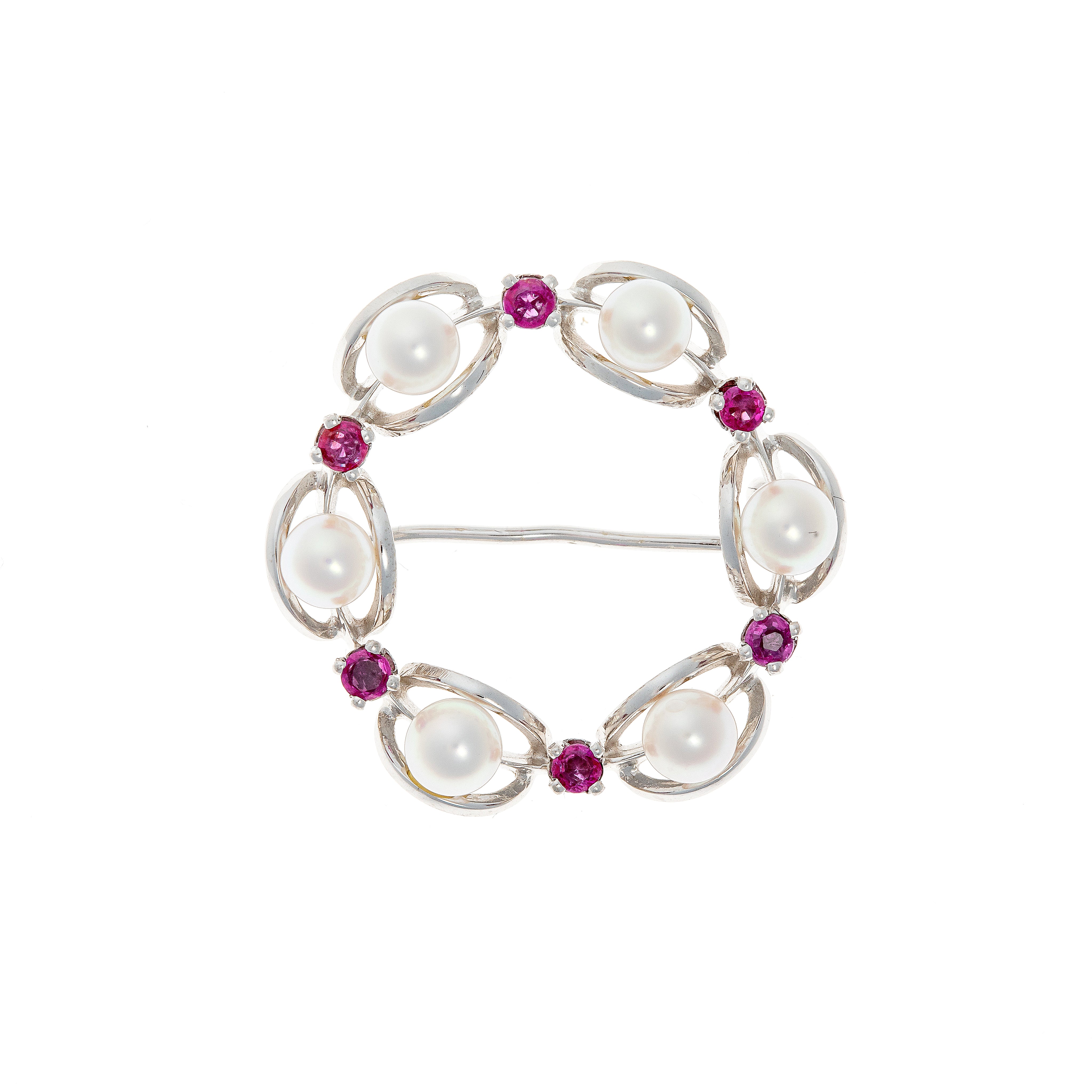 Mid-Century white gold wreath brooch with cultured pearls and rubies, featuring an openwork floral design.