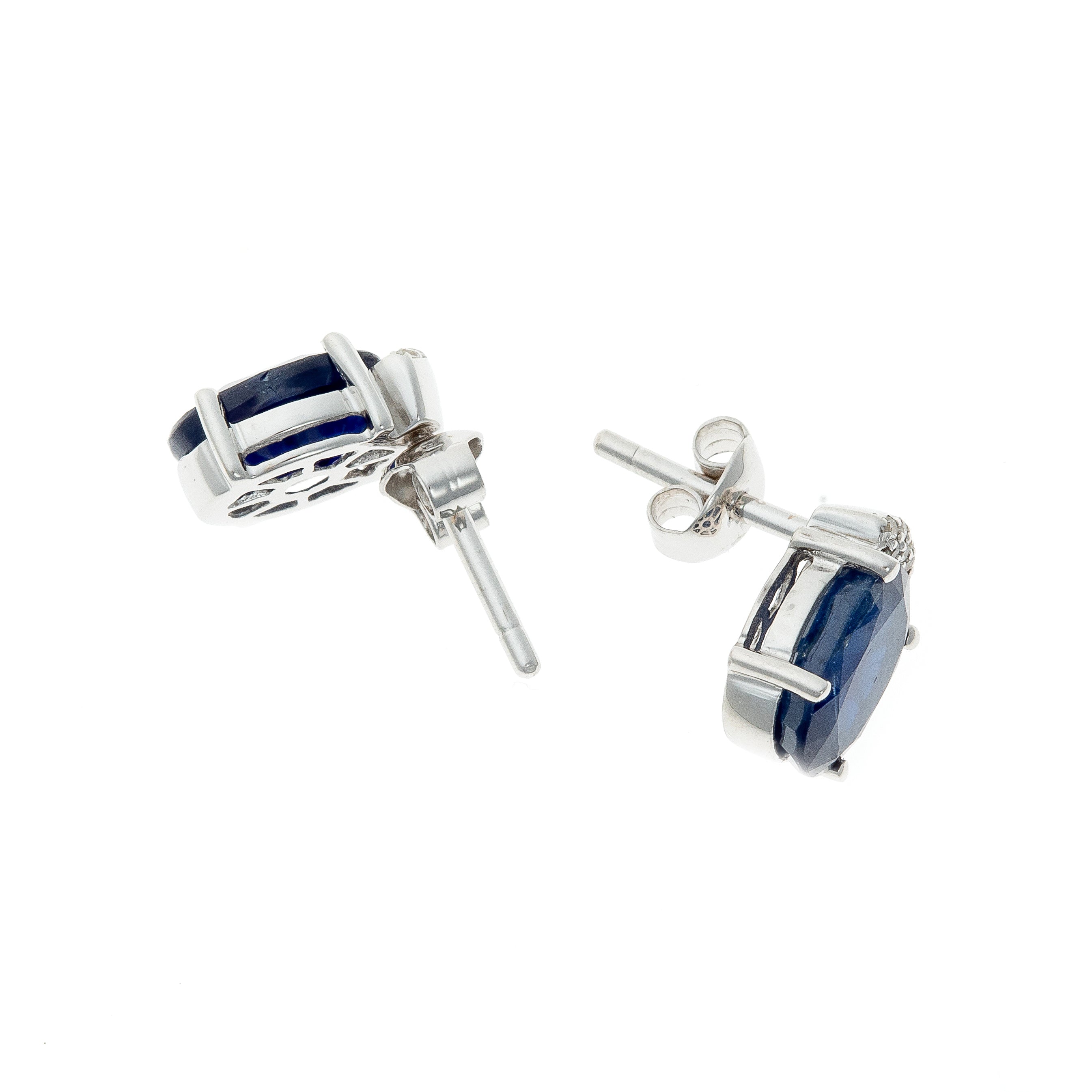 Angled view of the earrings, displaying the sapphire cut and diamond arrangement.