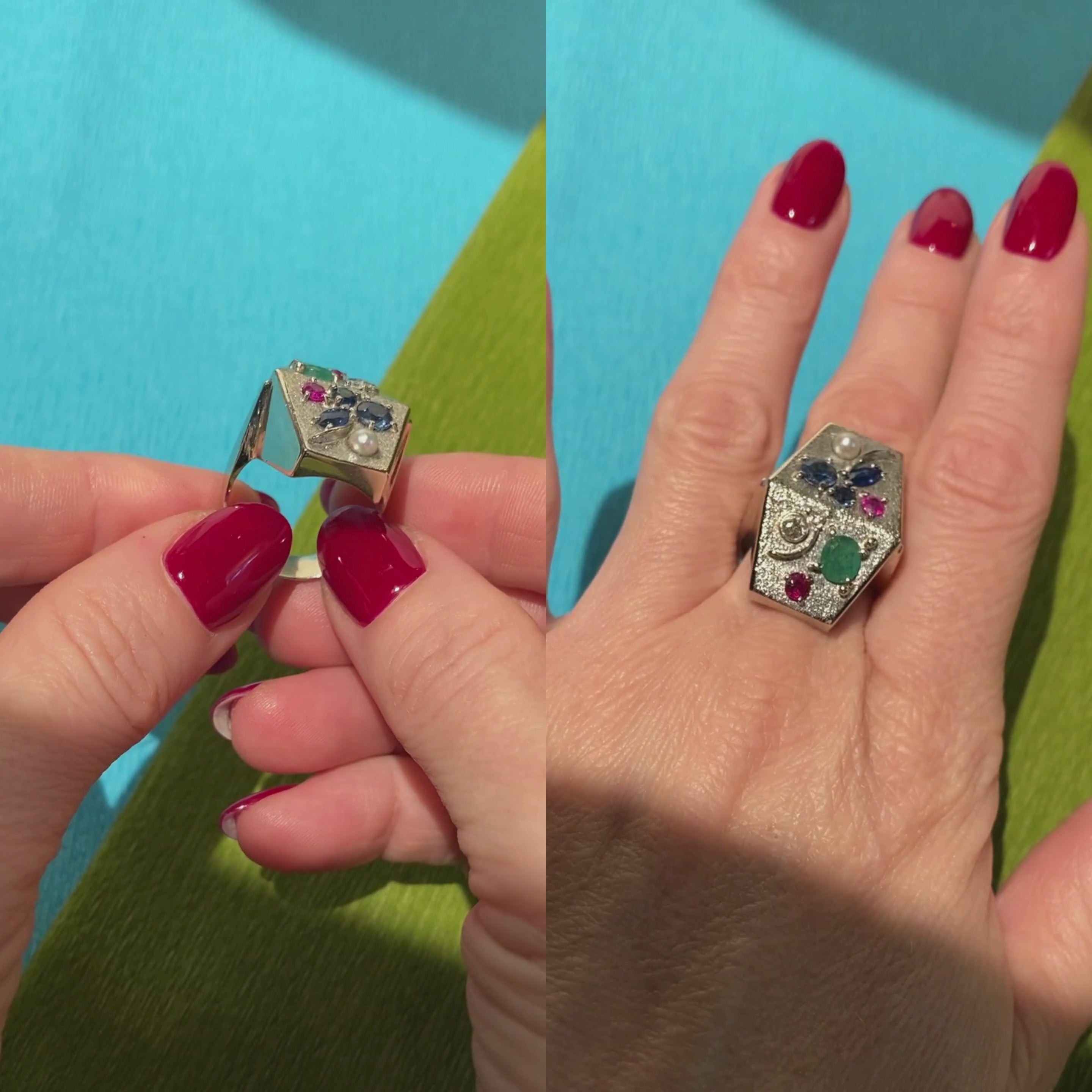 Woman wearing and showcasing the vintage Mid-Century modernist white gold multi-gem cocktail ring.