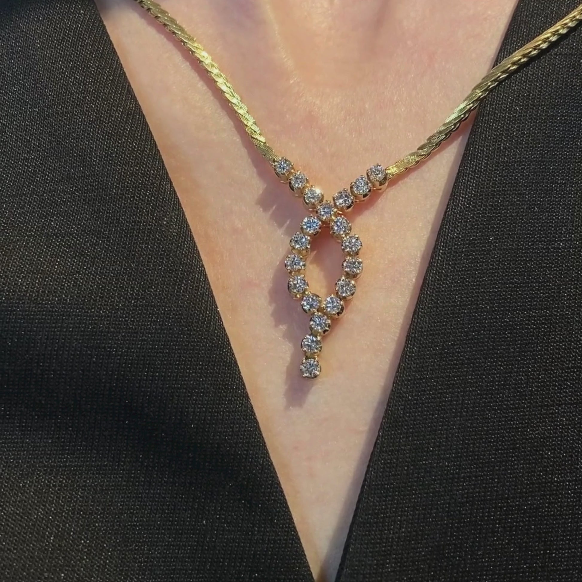 Woman wearing the elegant vintage Dutch 18K gold necklace with 20 brilliant-cut diamonds.