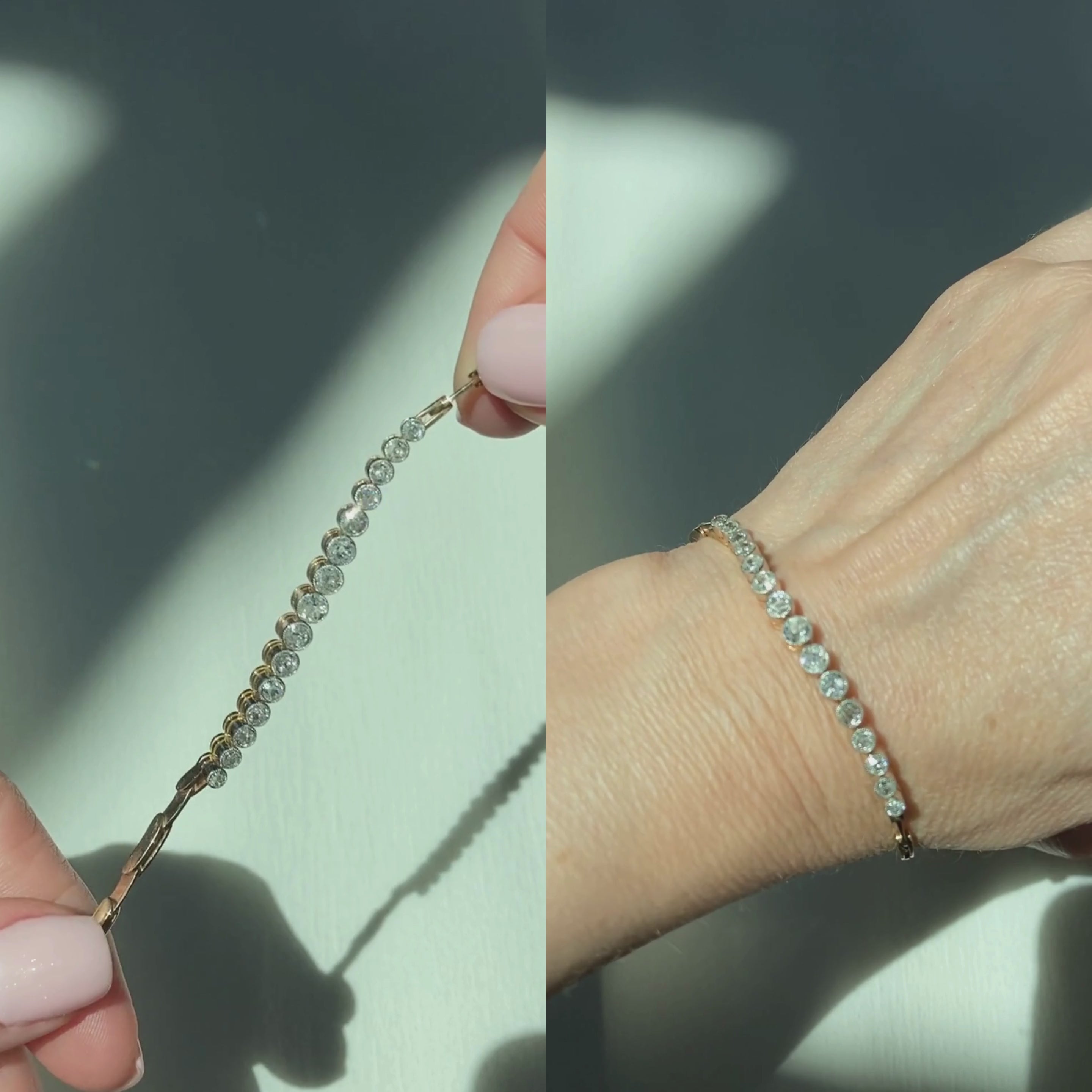 Woman showcasing and wearing vintage gold and platinum diamond bracelet.