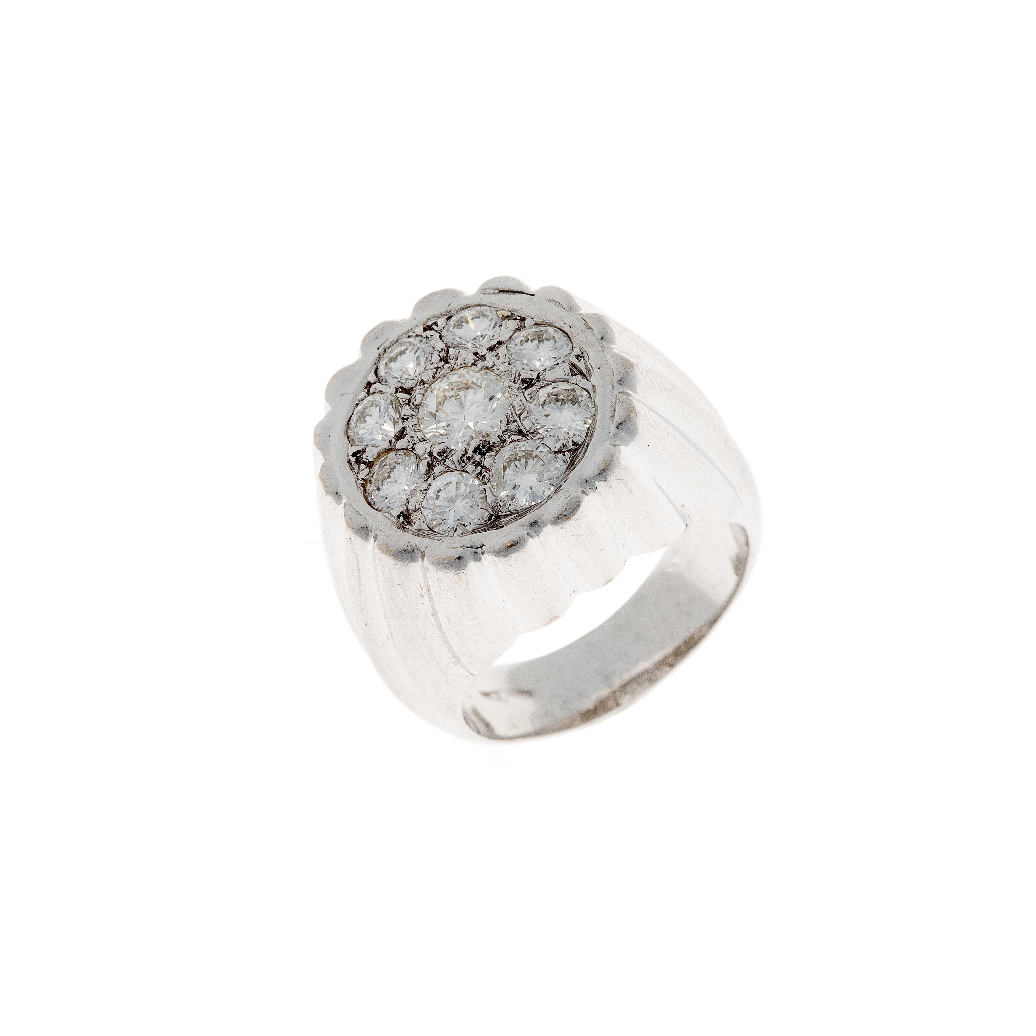 Retro 18K white gold diamond cocktail ring featuring a fluted gold design and a cluster of brilliant-cut diamonds, photographed at an angle.