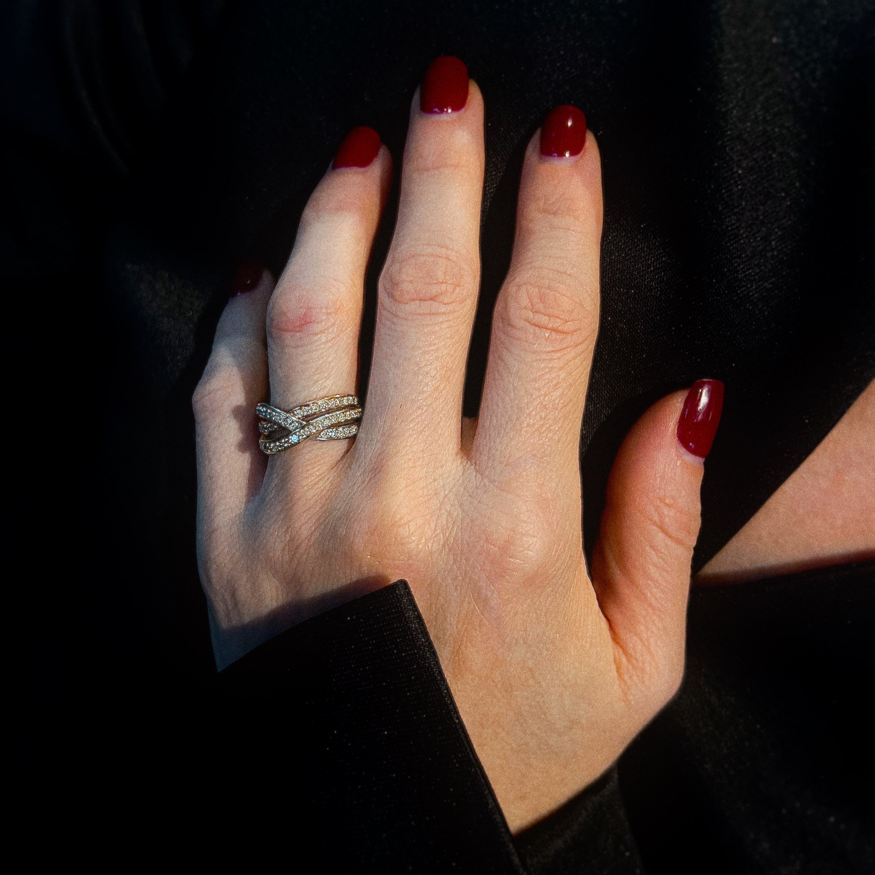 Model wearing the mid-century tri-gold ring with diamonds.