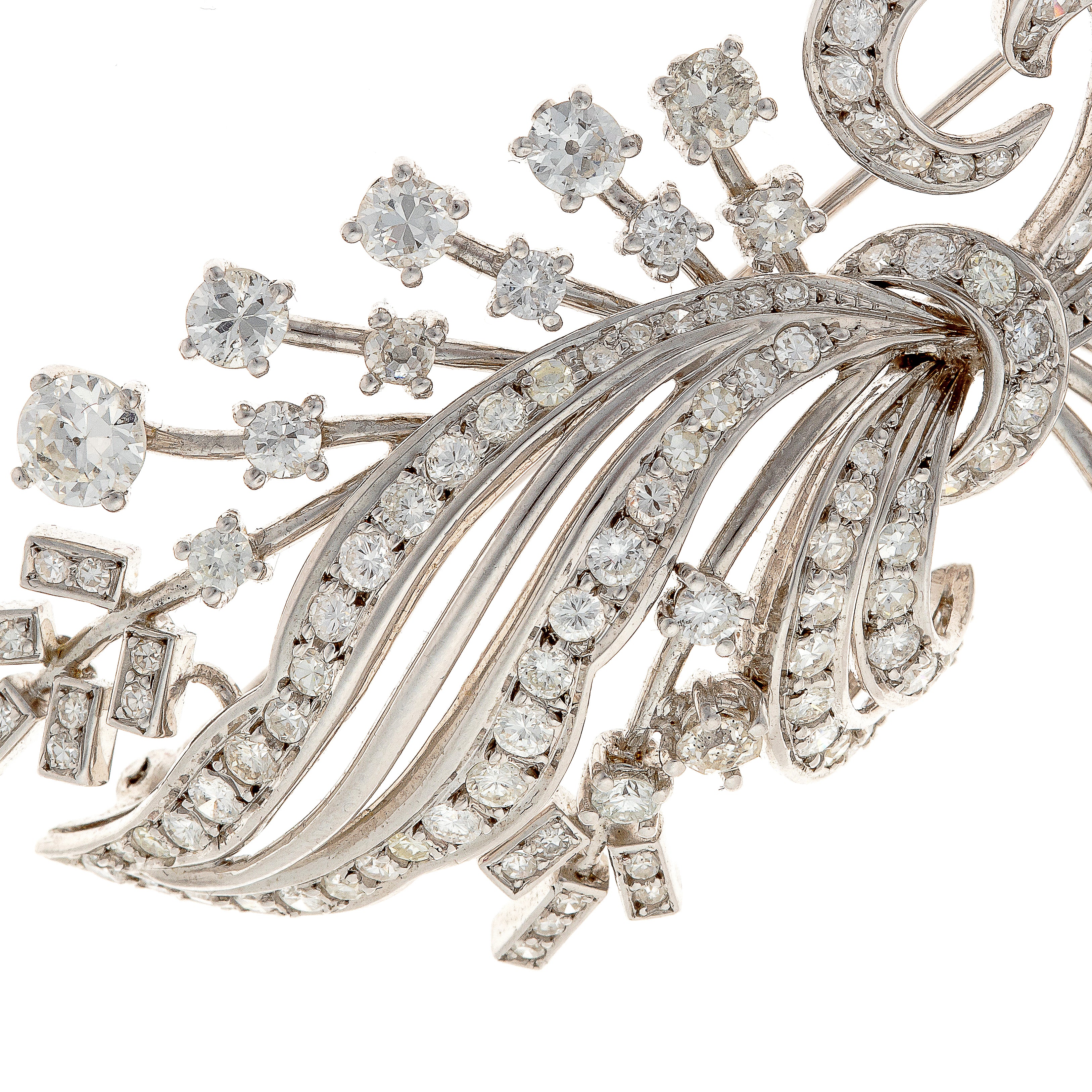 Diamond setting detail of Retro French diamond spray brooch in white gold.