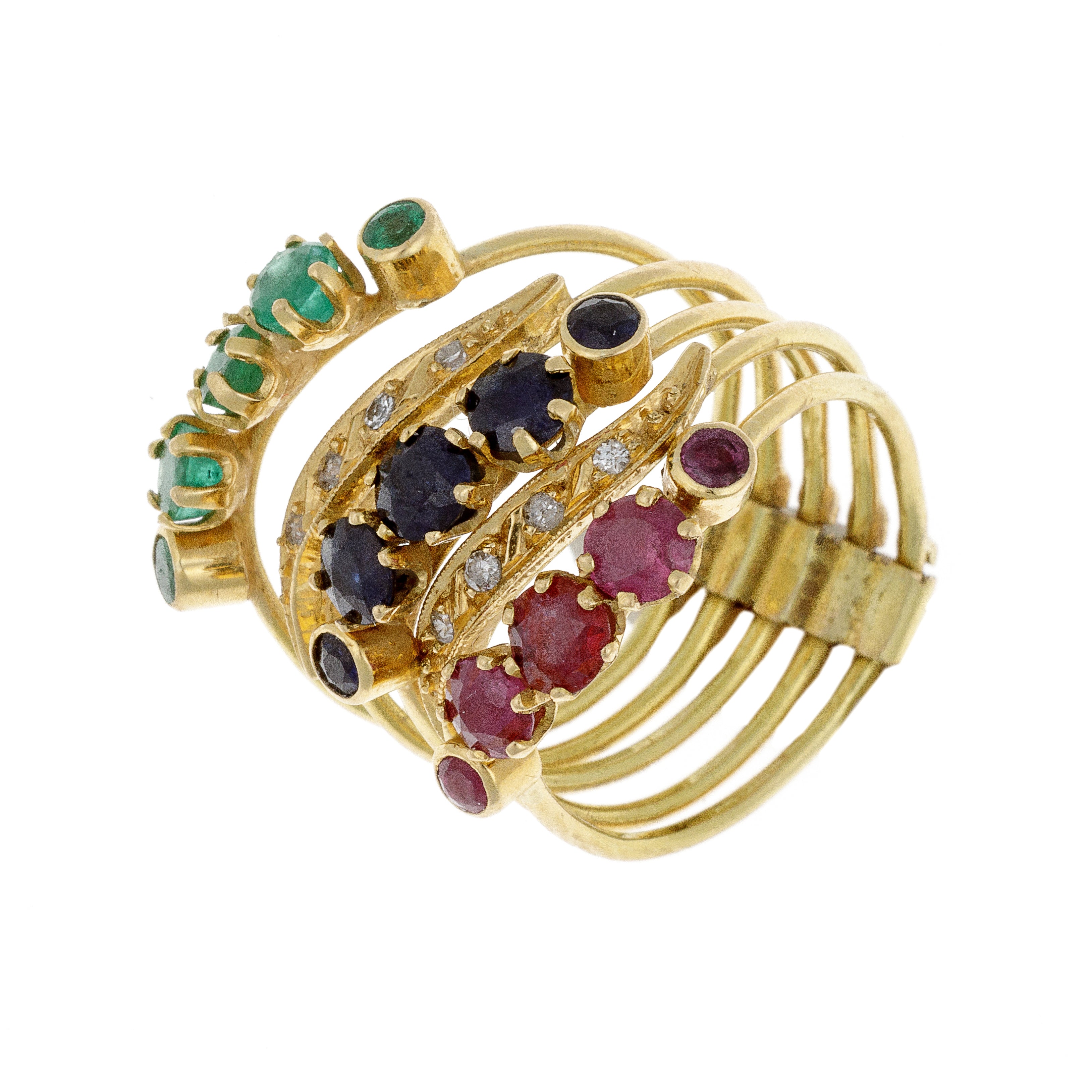 Angled view of Belgian gold ring showcasing colorful array of mixed gemstones.