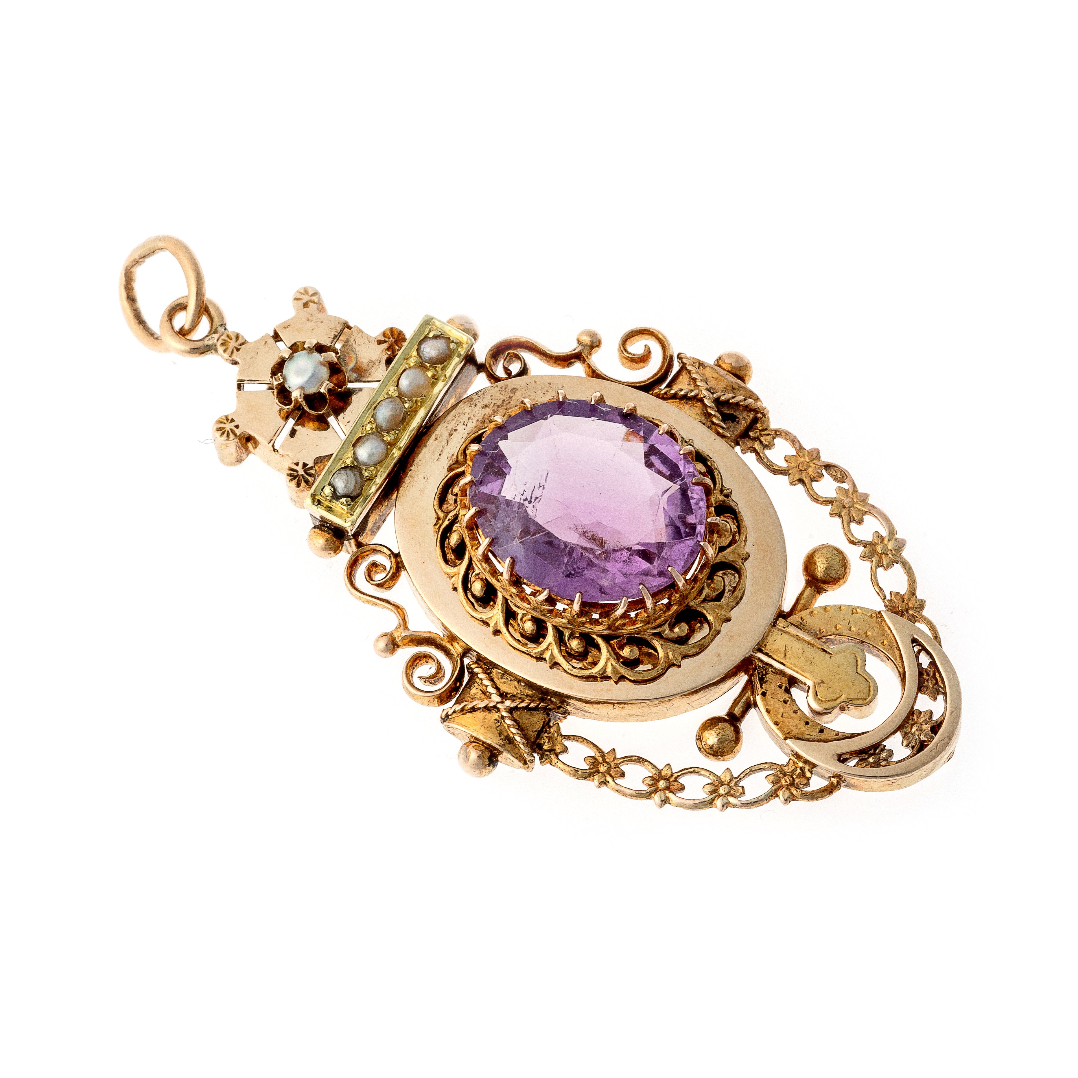 Angled view of the antique Victorian Etruscan Revival gold pendant with a central amethyst and pearls.