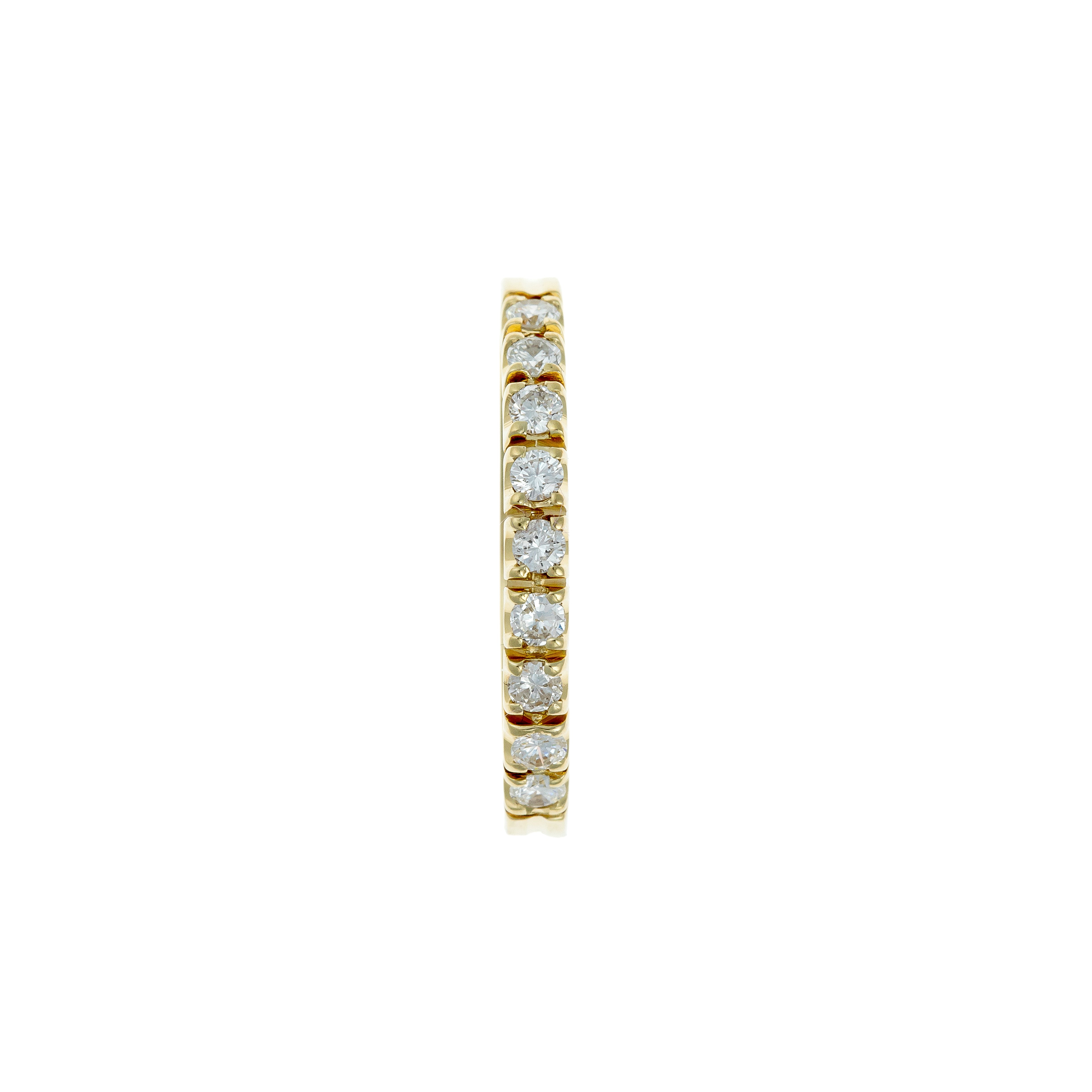 Top view showing nine brilliant-cut diamonds set across the gold band.