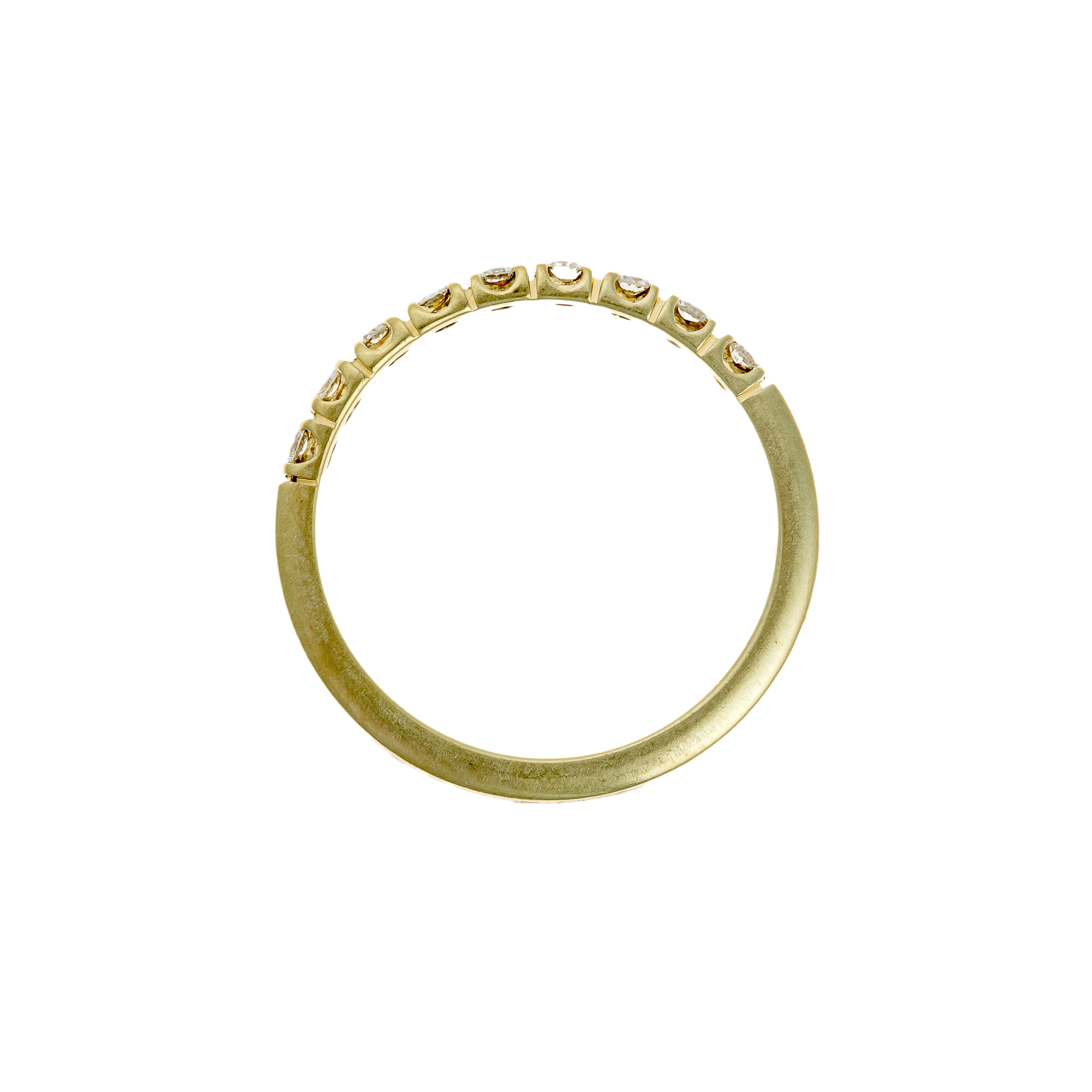 Profile of eternity ring showing slim gold shank and diamond height.