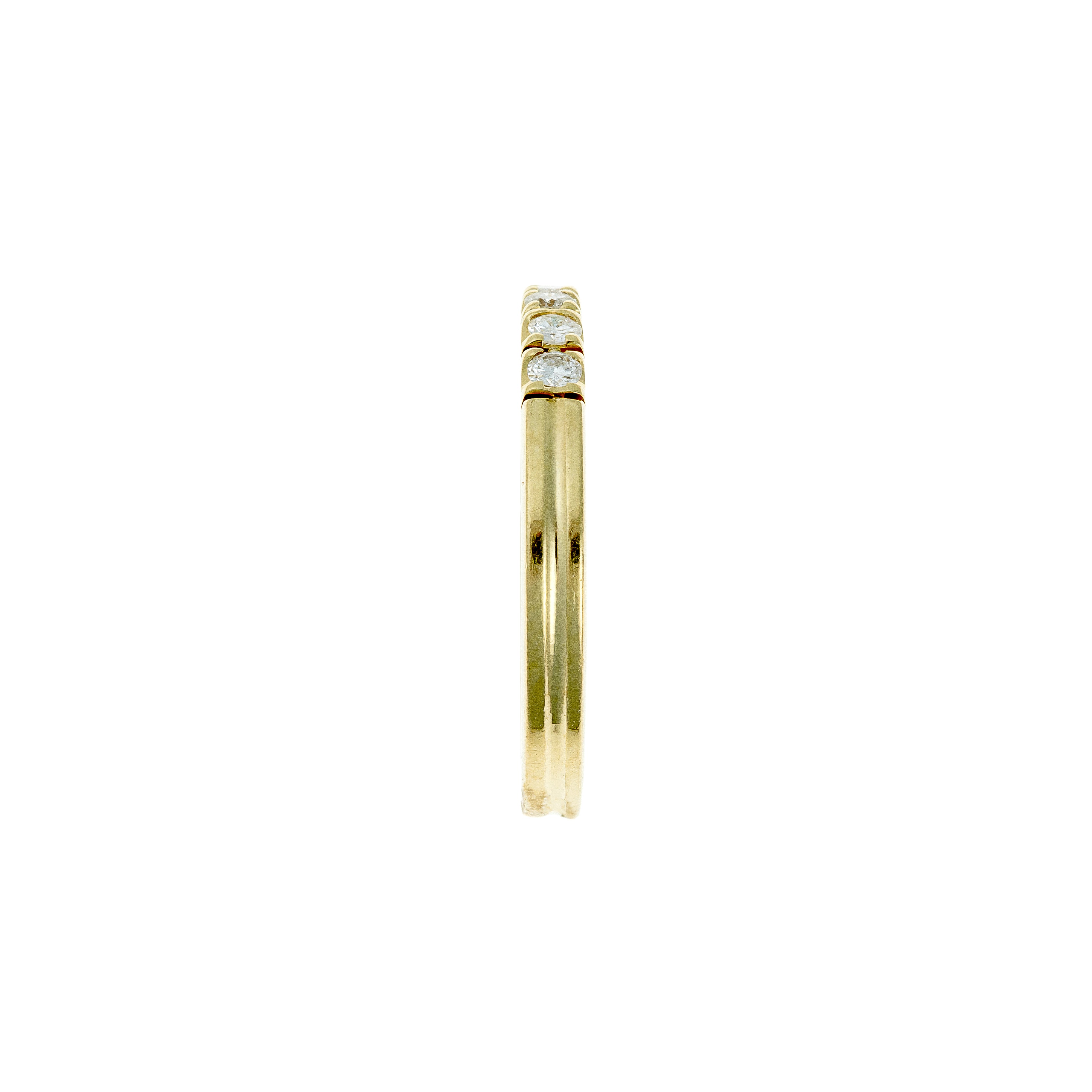 Side view of the ring highlighting open-prong diamond setting and gold band.
