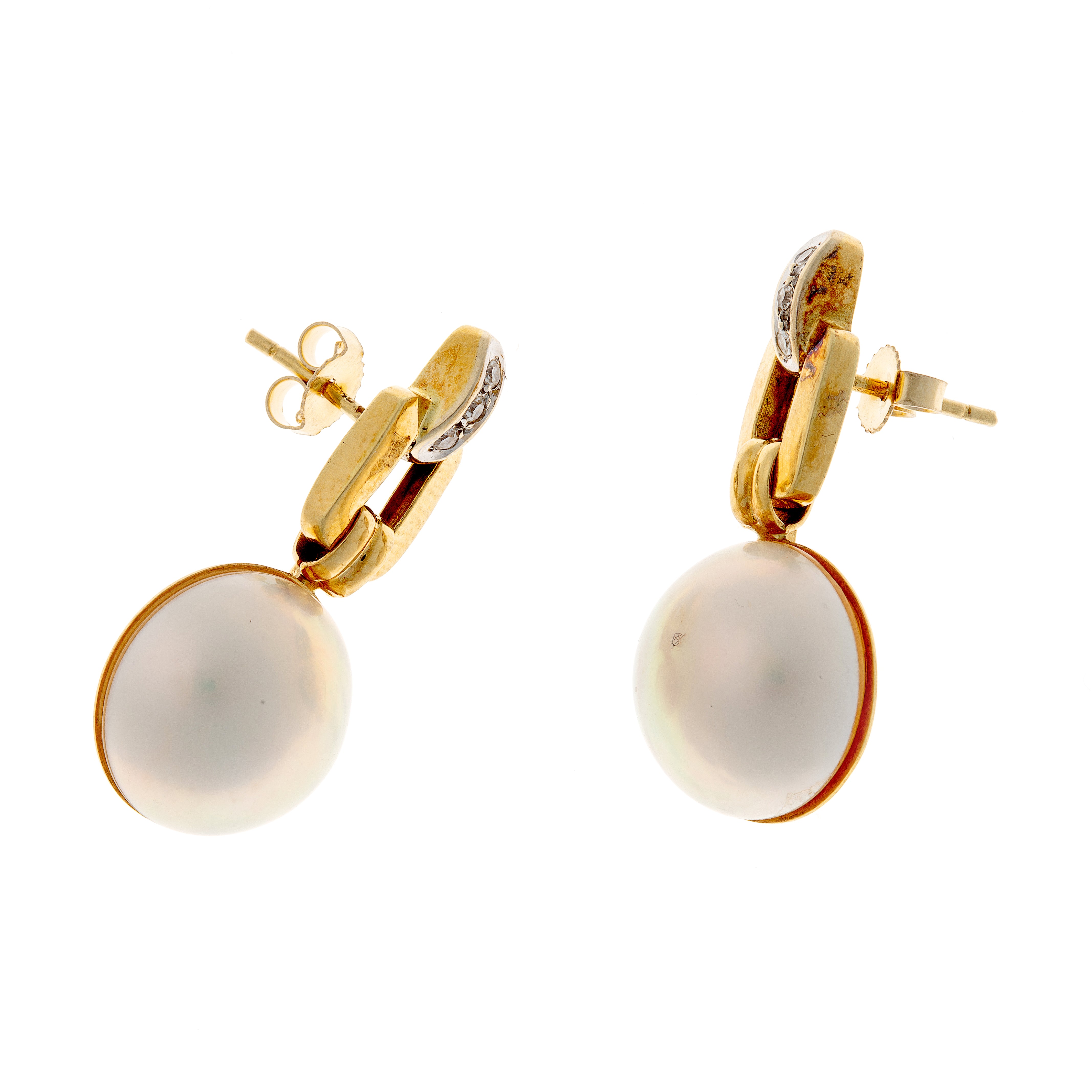 Vintage 14K gold drop earrings with pearls and diamonds, displayed as a pair.
