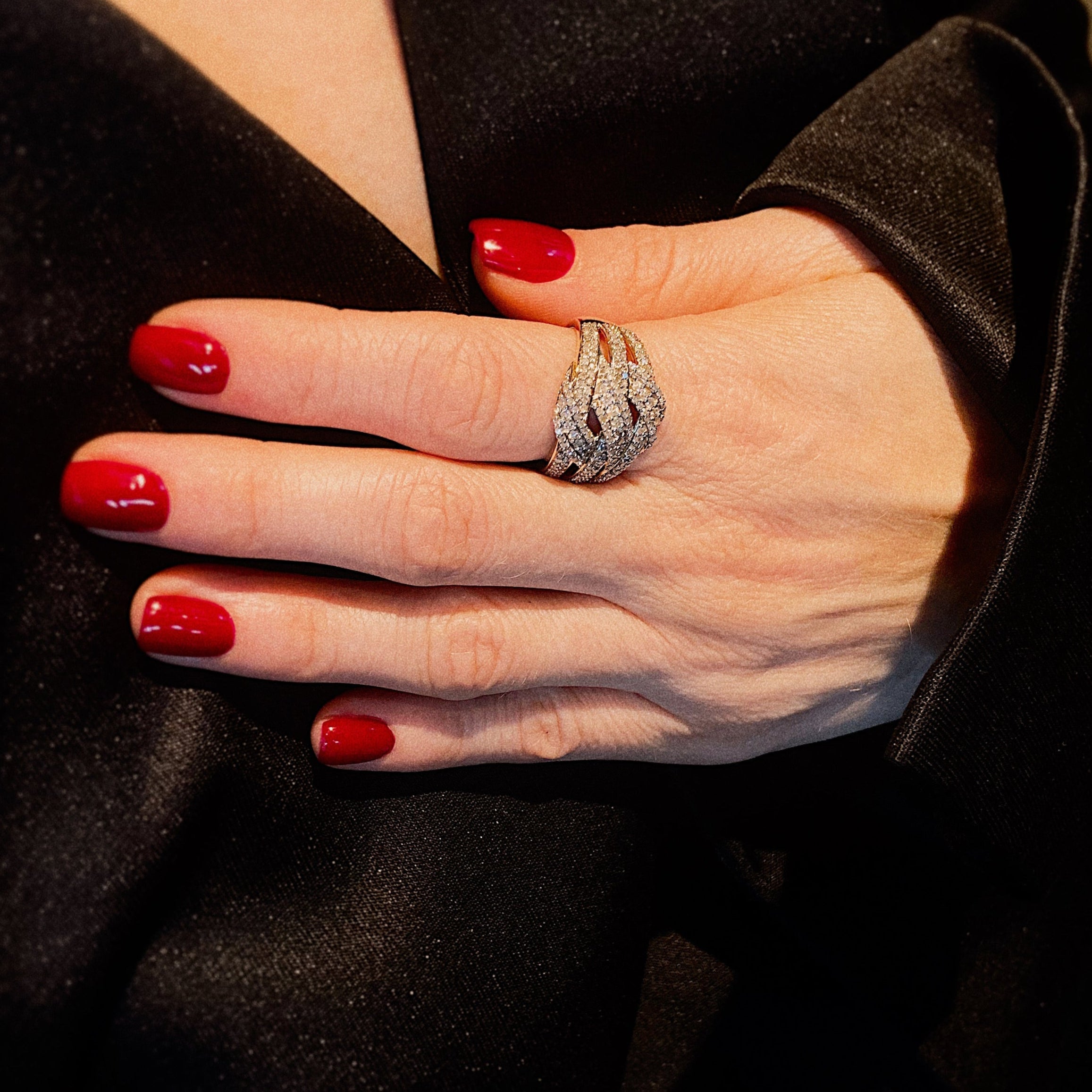 Model wearing the vintage gold cocktail ring with 213 pave-set diamonds.