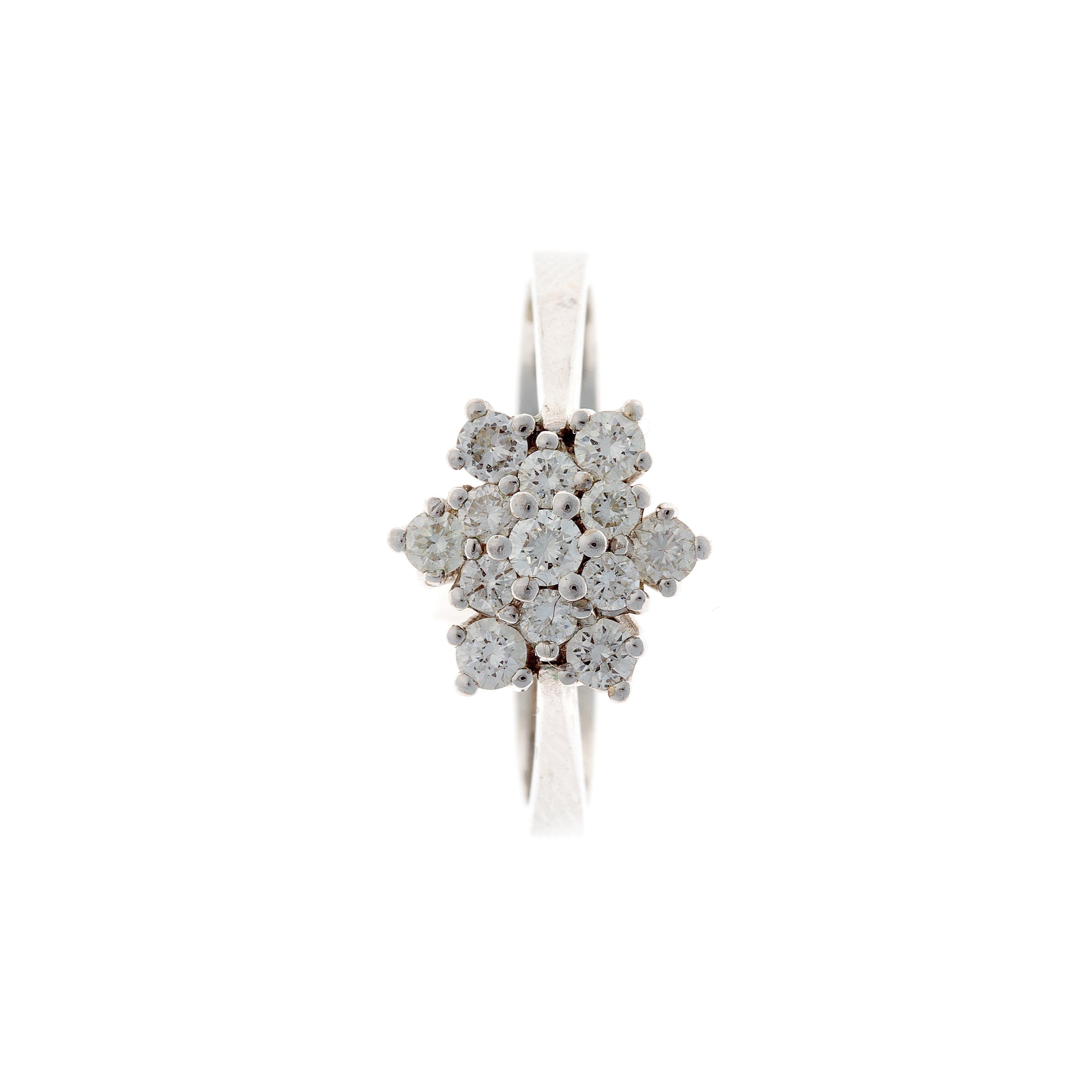 Top view of a vintage white gold diamond cluster ring, showcasing its intricate multi-stone design.