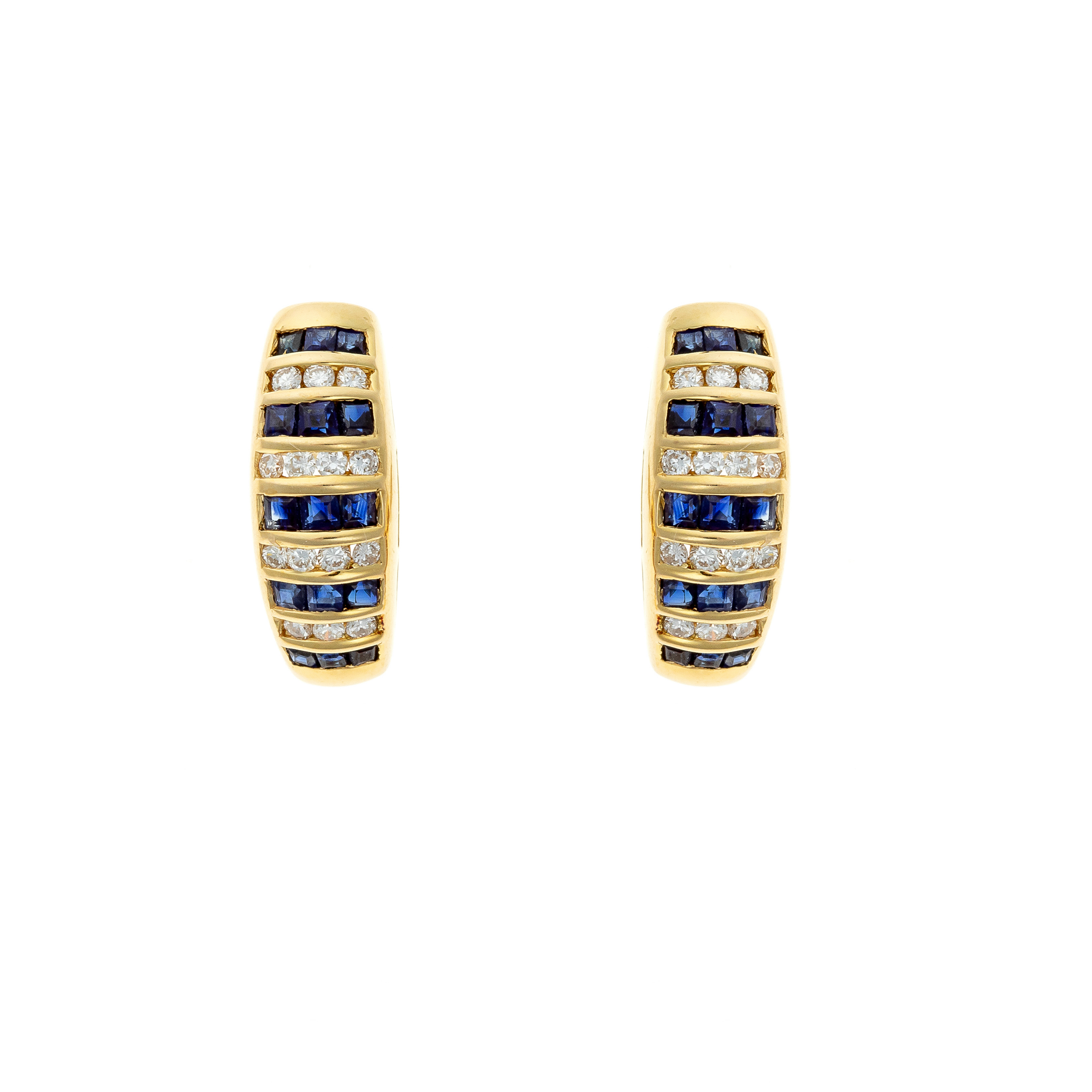Frontal look of the sapphire and diamond rows emphasizing the earrings’ balanced French craftsmanship.