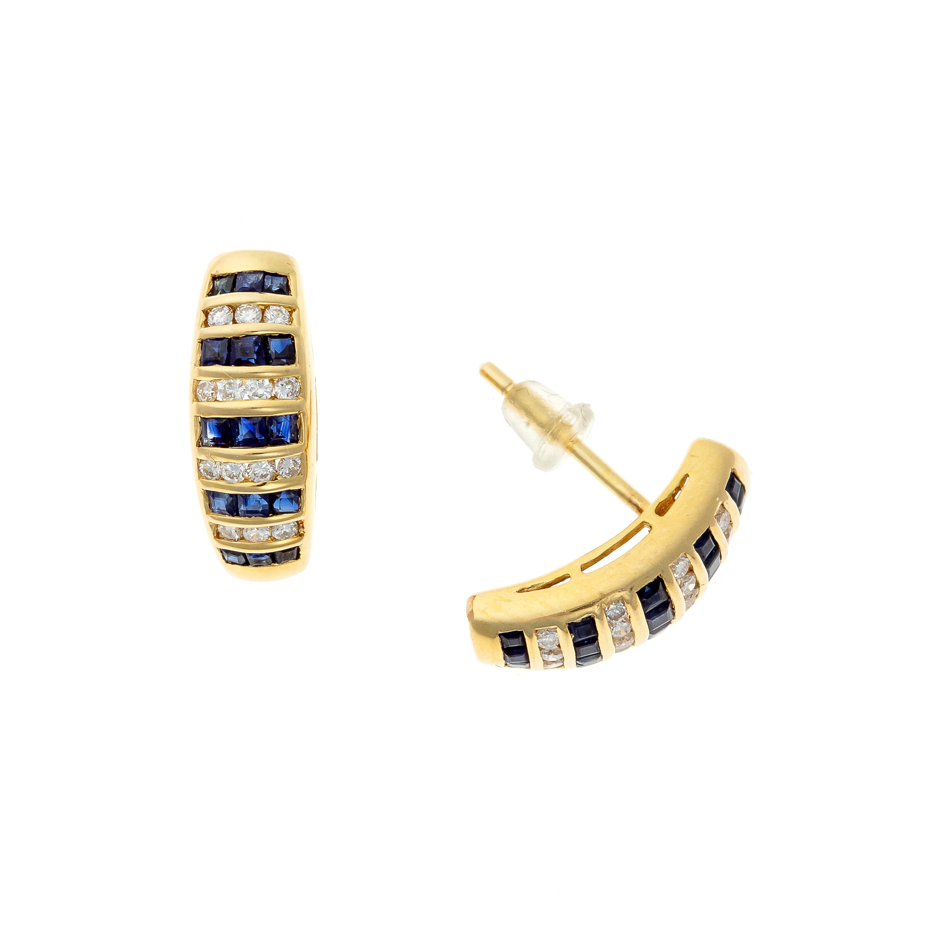 Side view showcasing the curved half-hoop design and channel-set gems in 18k gold.