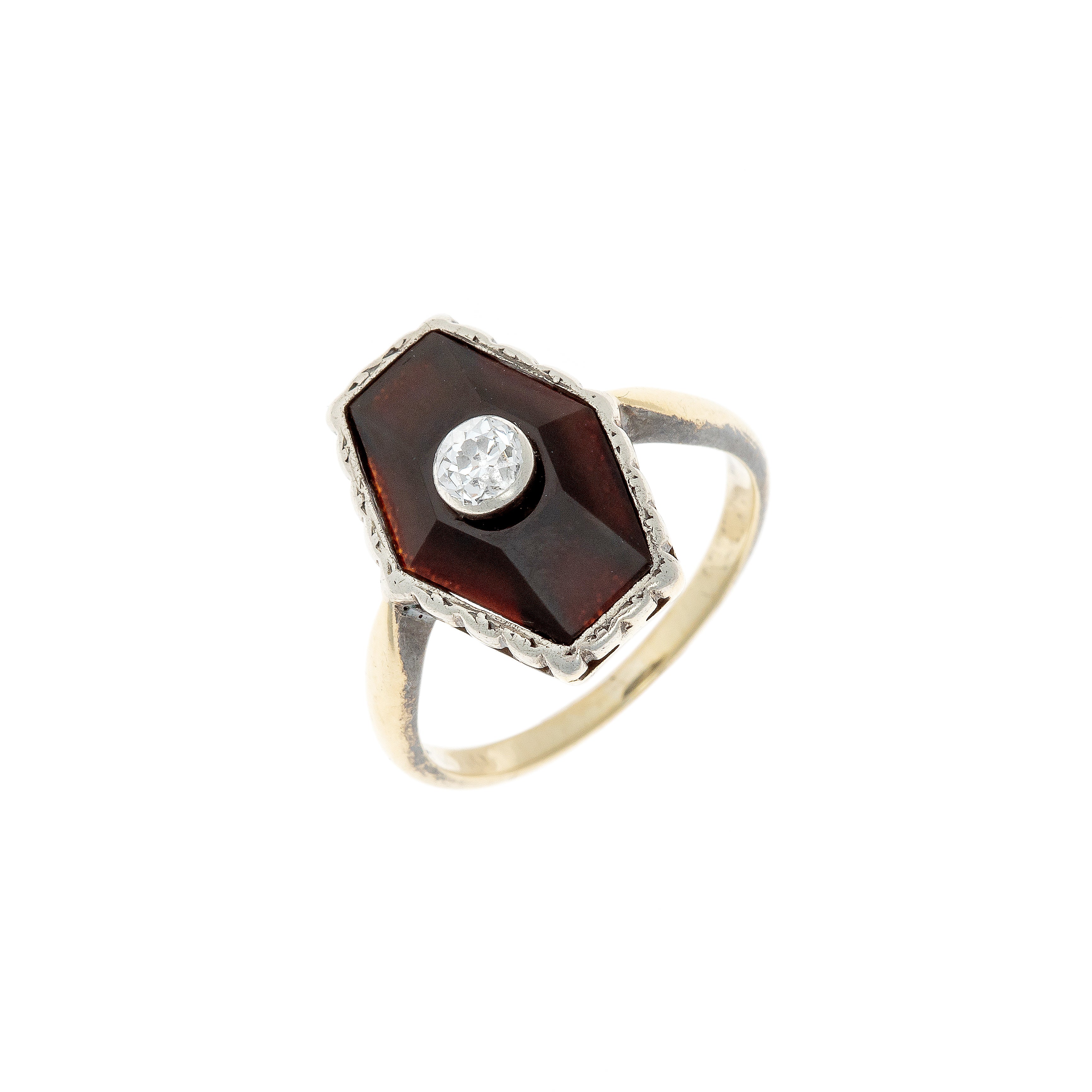 Art Deco 9K gold and 830 silver ring featuring a hexagonal onyx inlay with a central 0.23ct diamond, photographed at an angle.