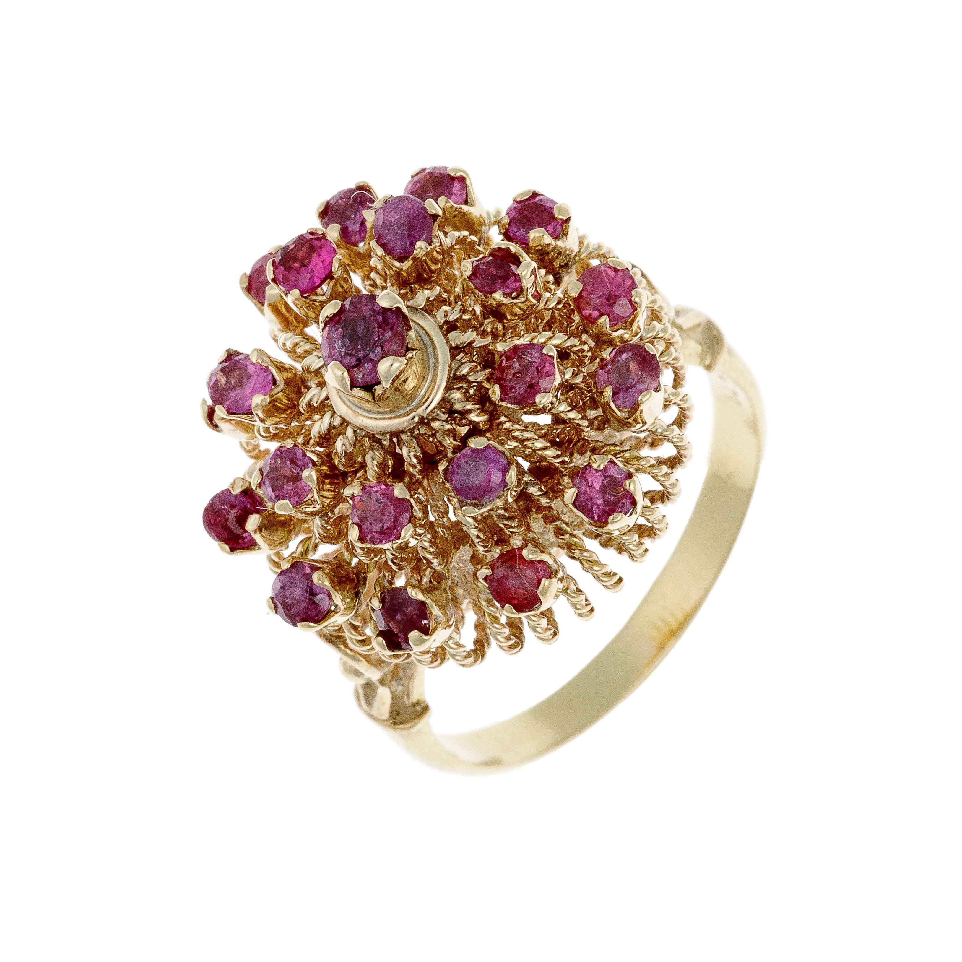 Angled perspective of vibrant ruby cluster gold ring with intricate setting.
