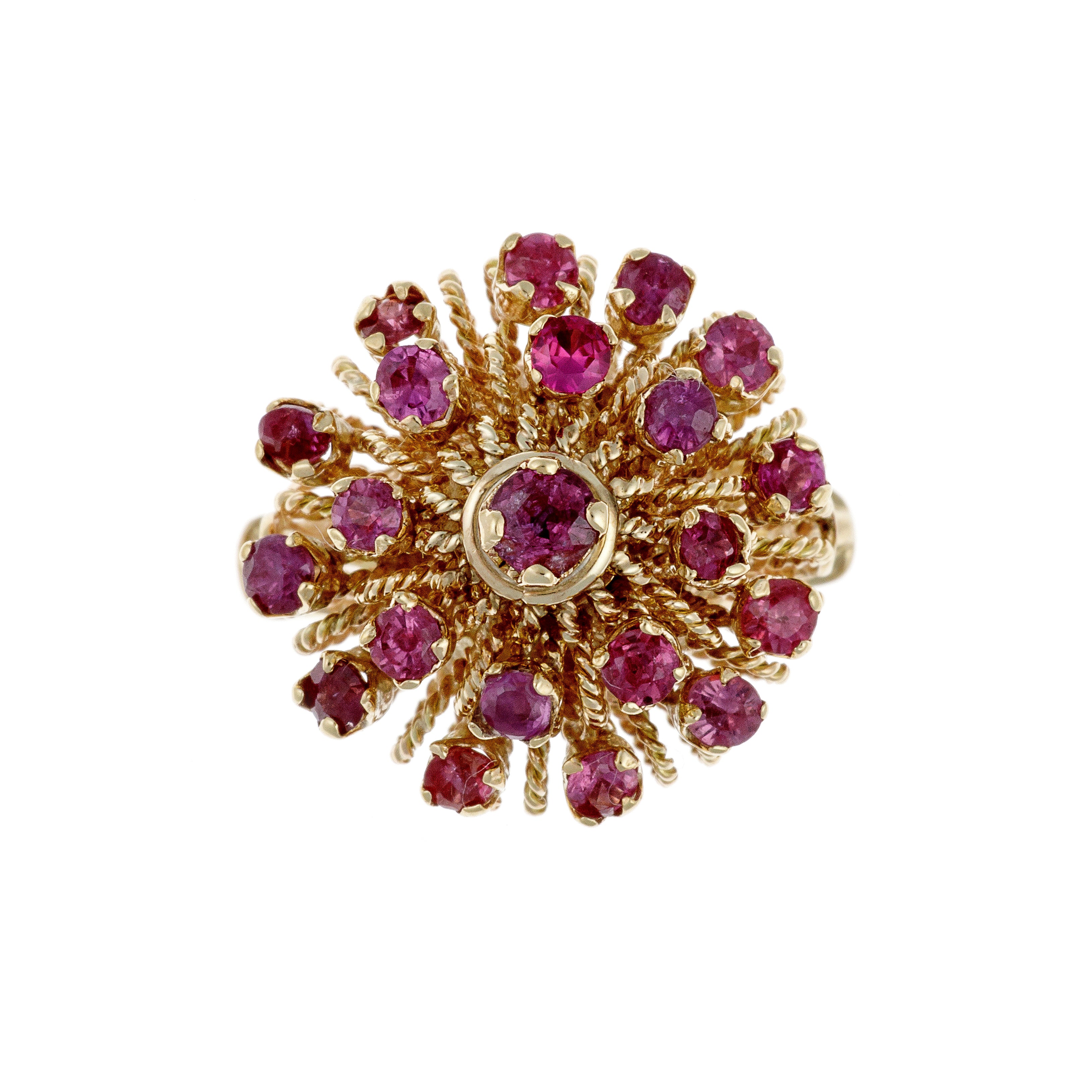 Front view of vintage 9K gold ring with radiating cluster of rubies in a bold floral design.