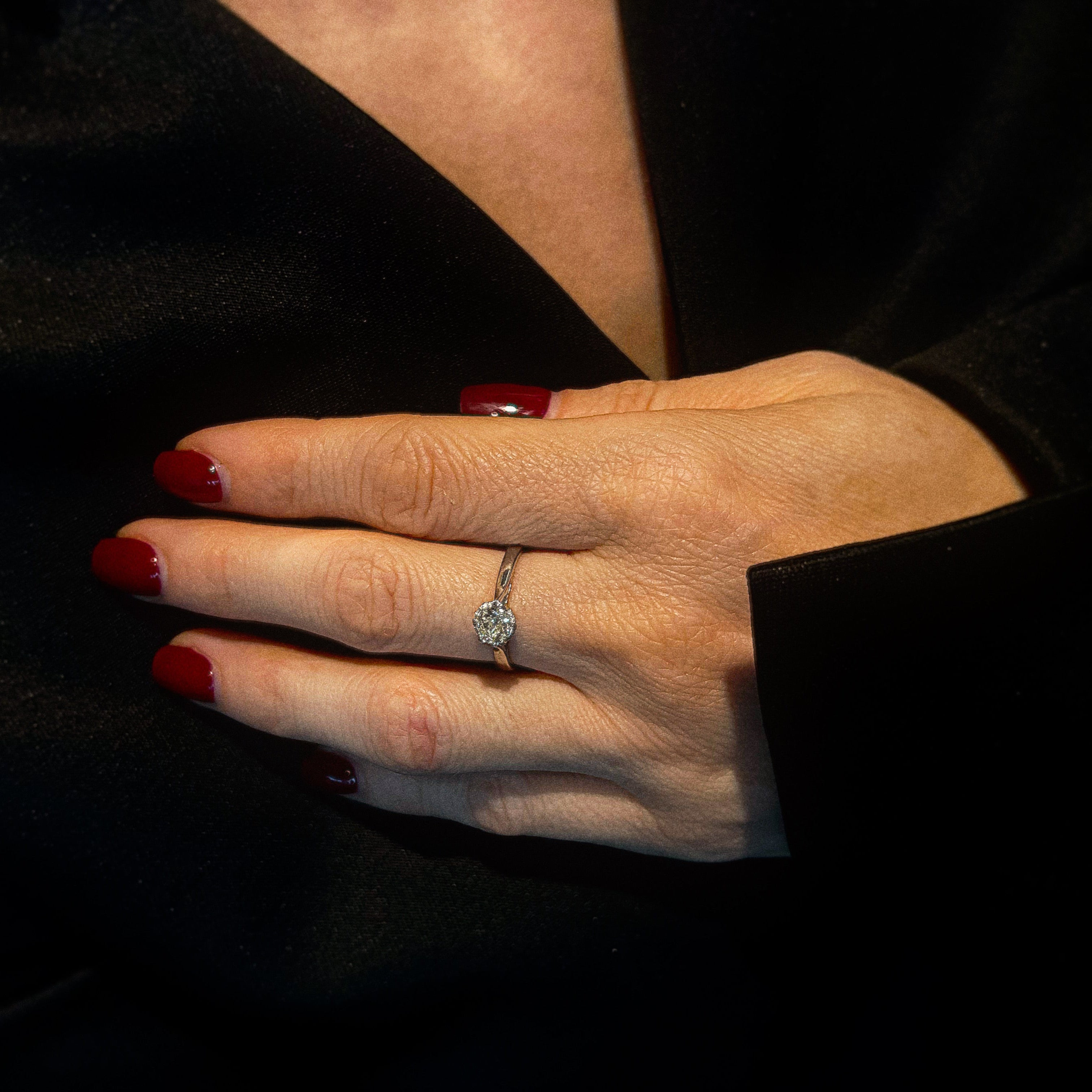 Model wearing the vintage white gold diamond solitaire engagement ring.