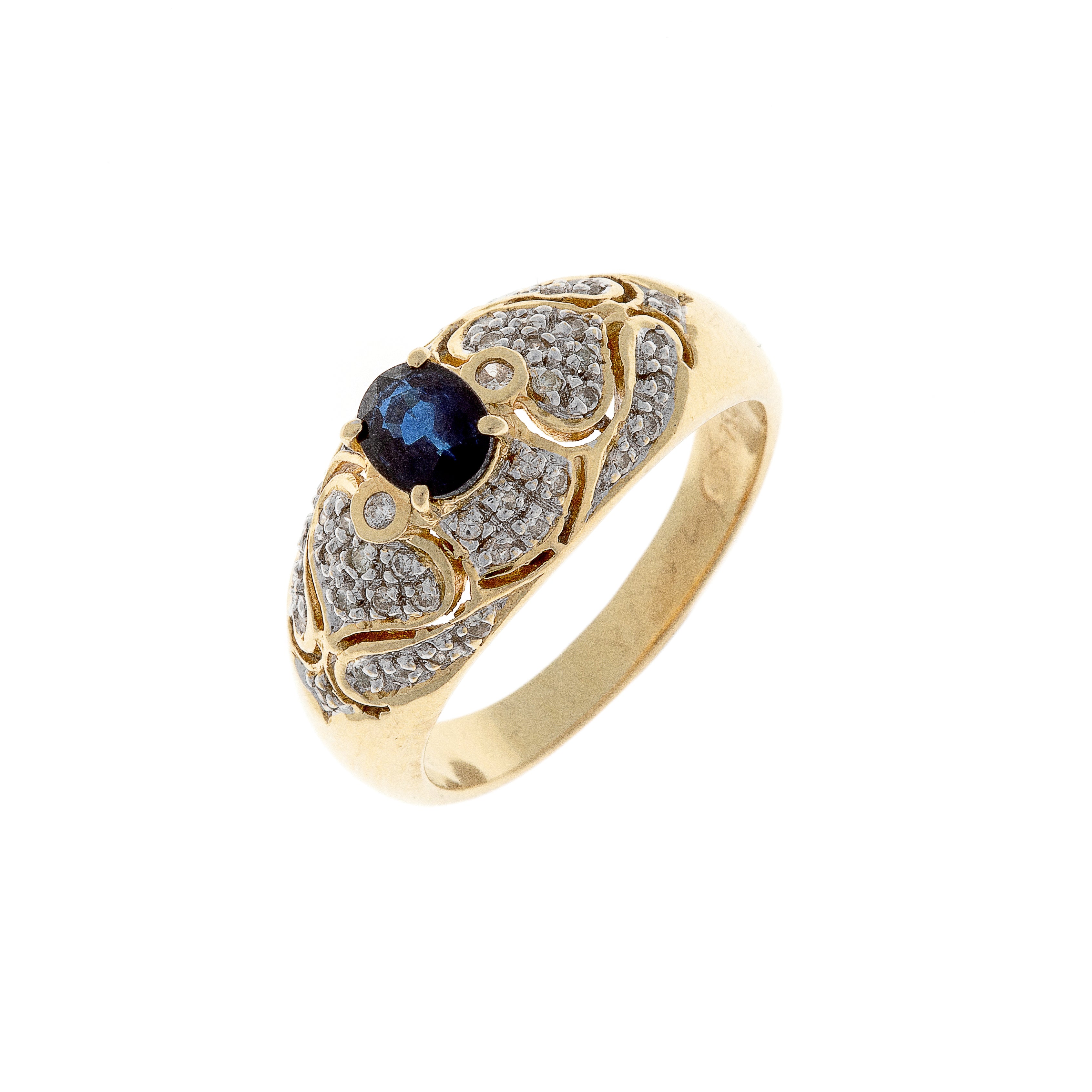 Edwardian revival contemporary vintage gold ring with oval sapphire centerpiece and pavé diamond accents.