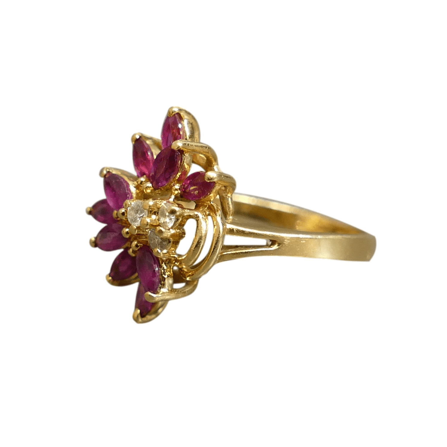 Vintage French 18k gold ruby and diamond cocktail ring with a sculptural asymmetrical band and floral gemstone design