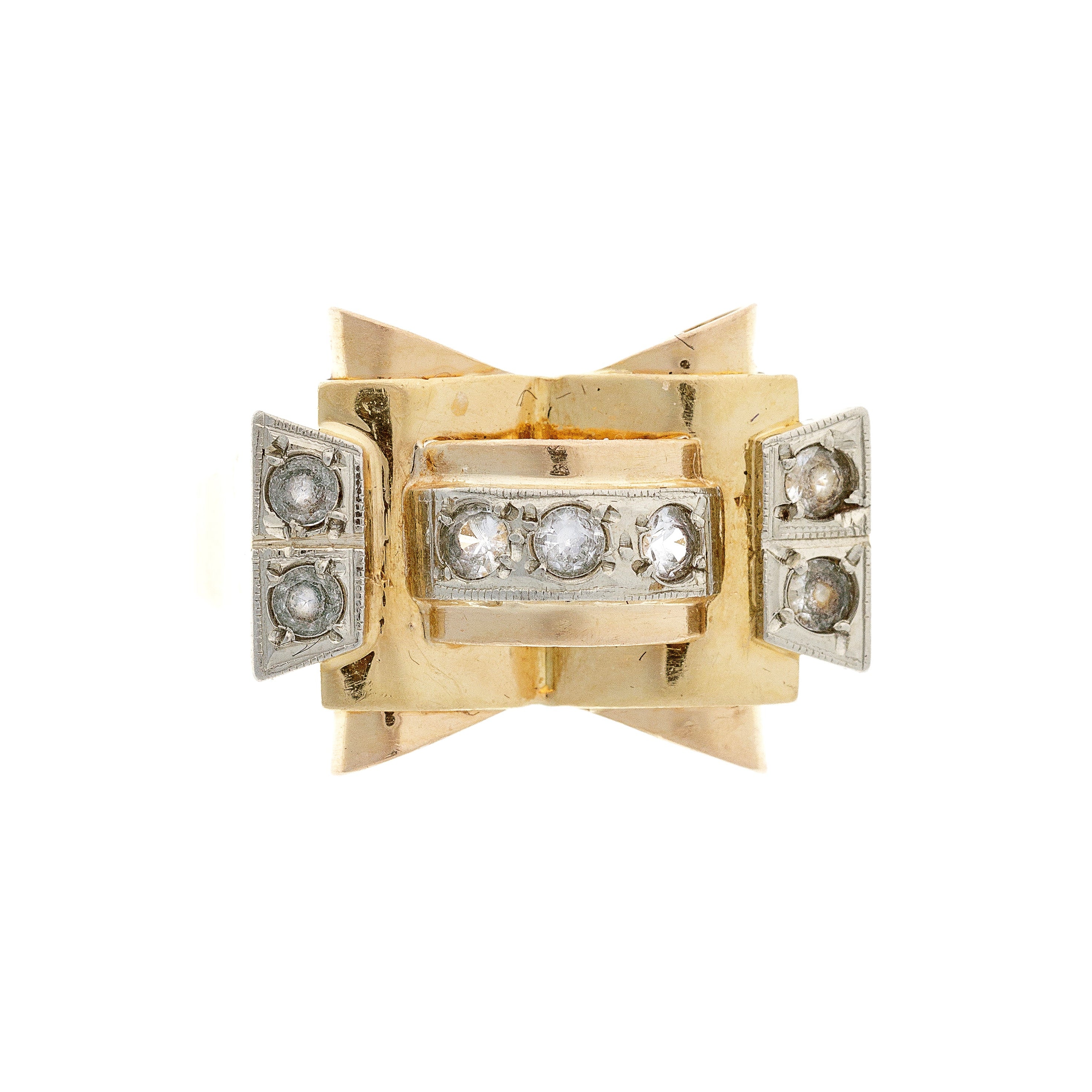A vintage 18K gold Art Deco tank ring with a bold geometric design, featuring polished gold surfaces and intricate architectural detailing.