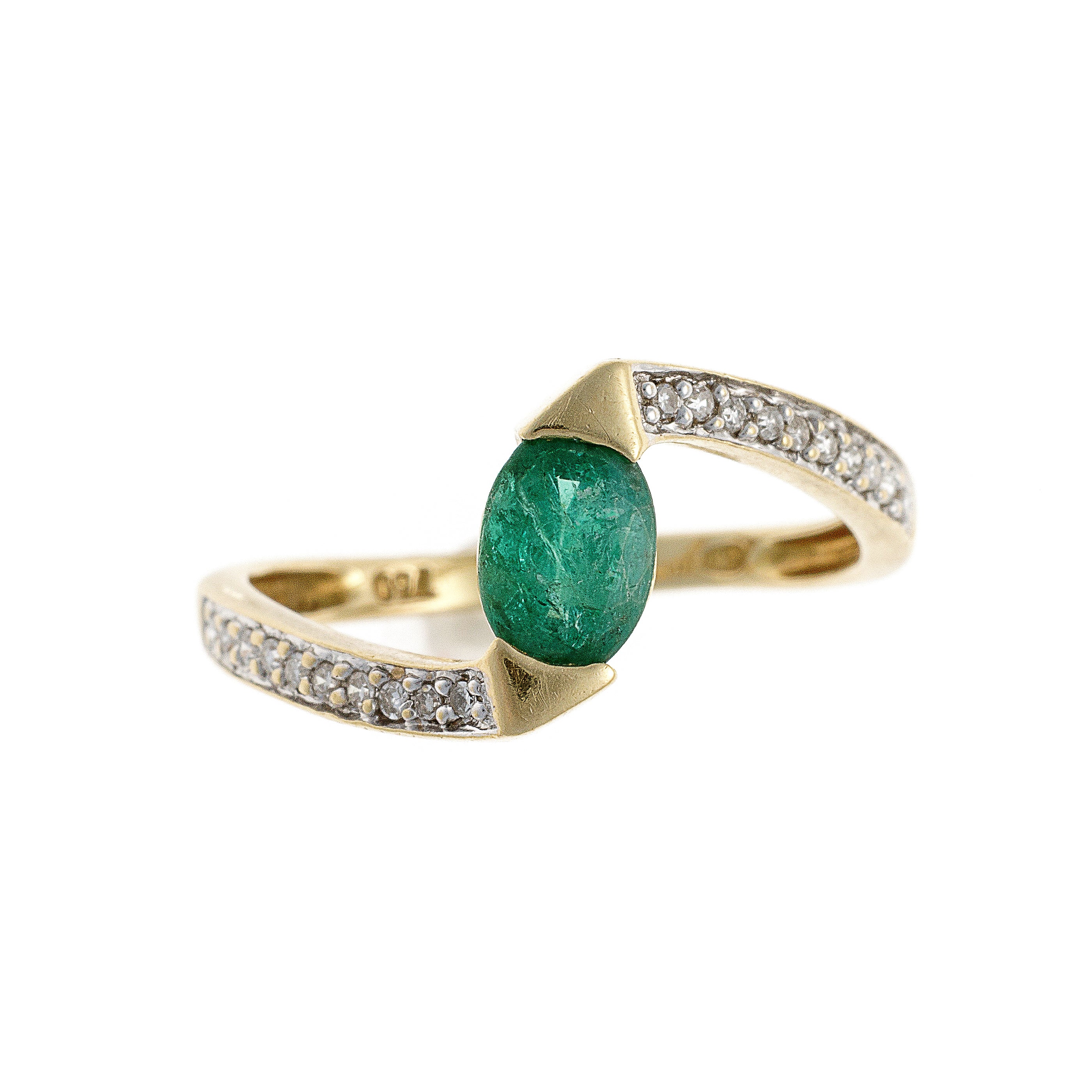 A vintage 18K gold bypass ring featuring a striking 1.0 ct emerald cradled between diamond-encrusted sweeping bands.