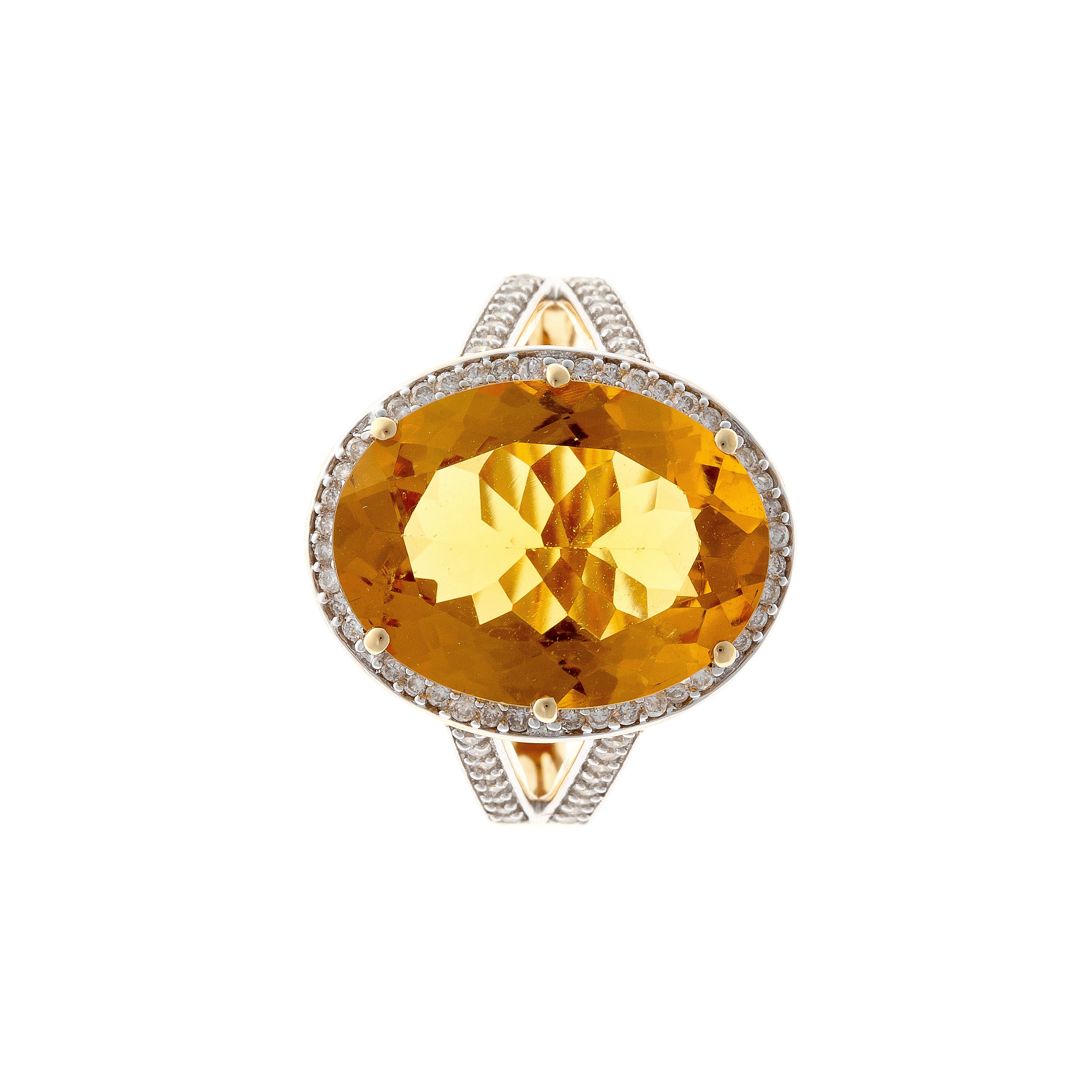Top view of the contemporary vintage gold cocktail ring with faceted heliodor and diamond halo.