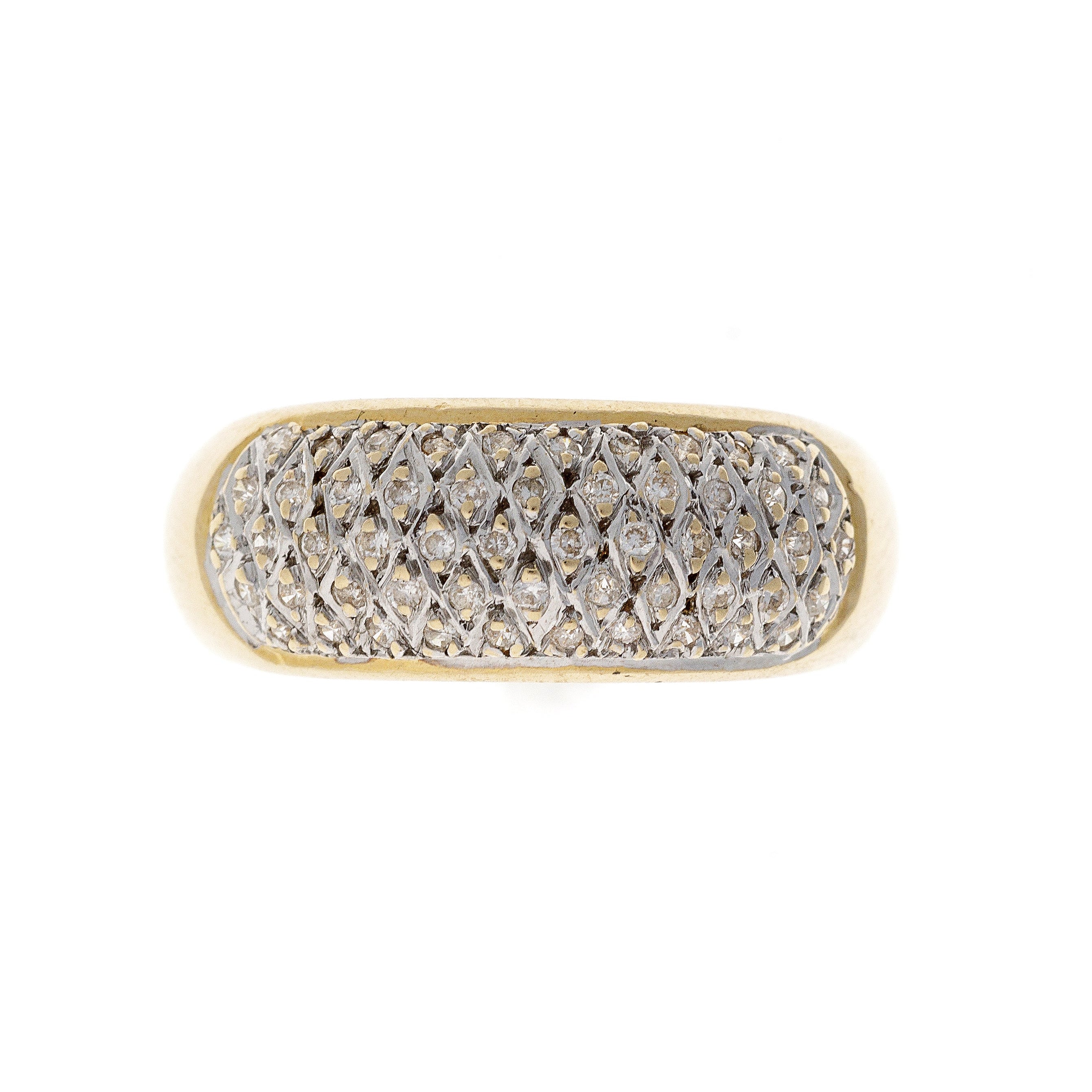 A vintage 18K gold pavé band ring adorned with a shimmering lattice of brilliant-cut diamonds, creating a radiant and elegant surface.