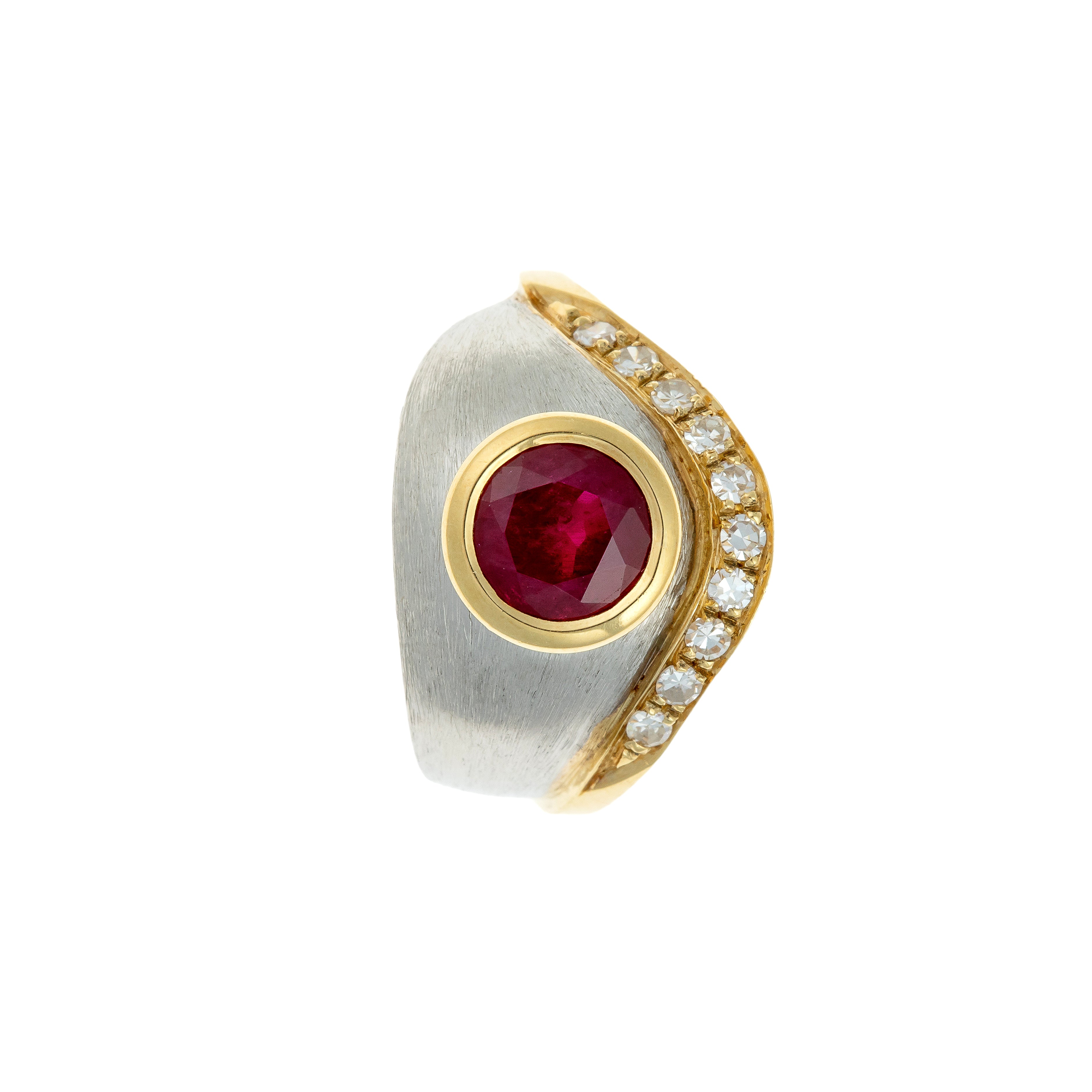 Top-down view of the vintage sculptural gold ring with ruby centerpiece and brushed platinum wave detail.