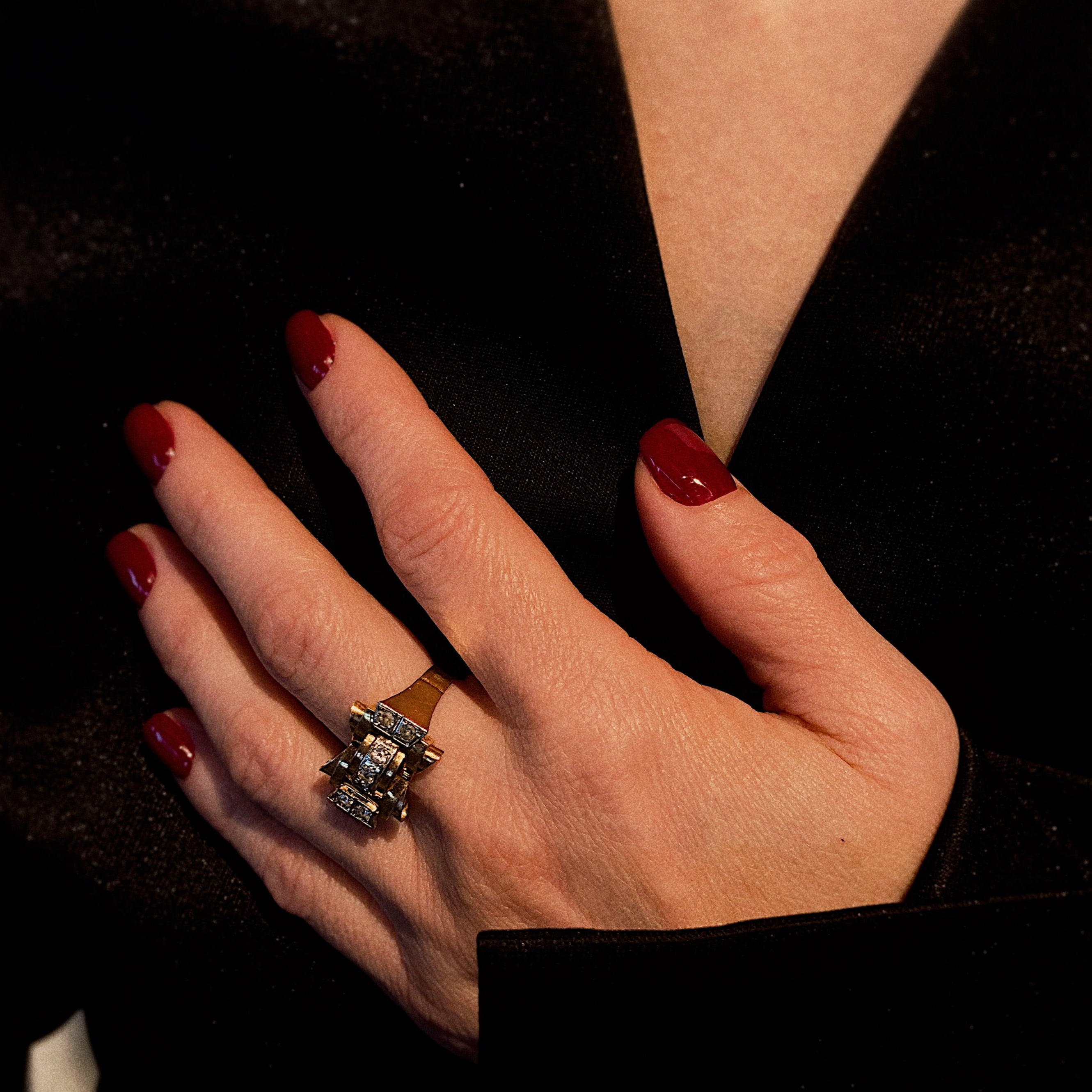 Model wearing the retro gold tank statement ring.