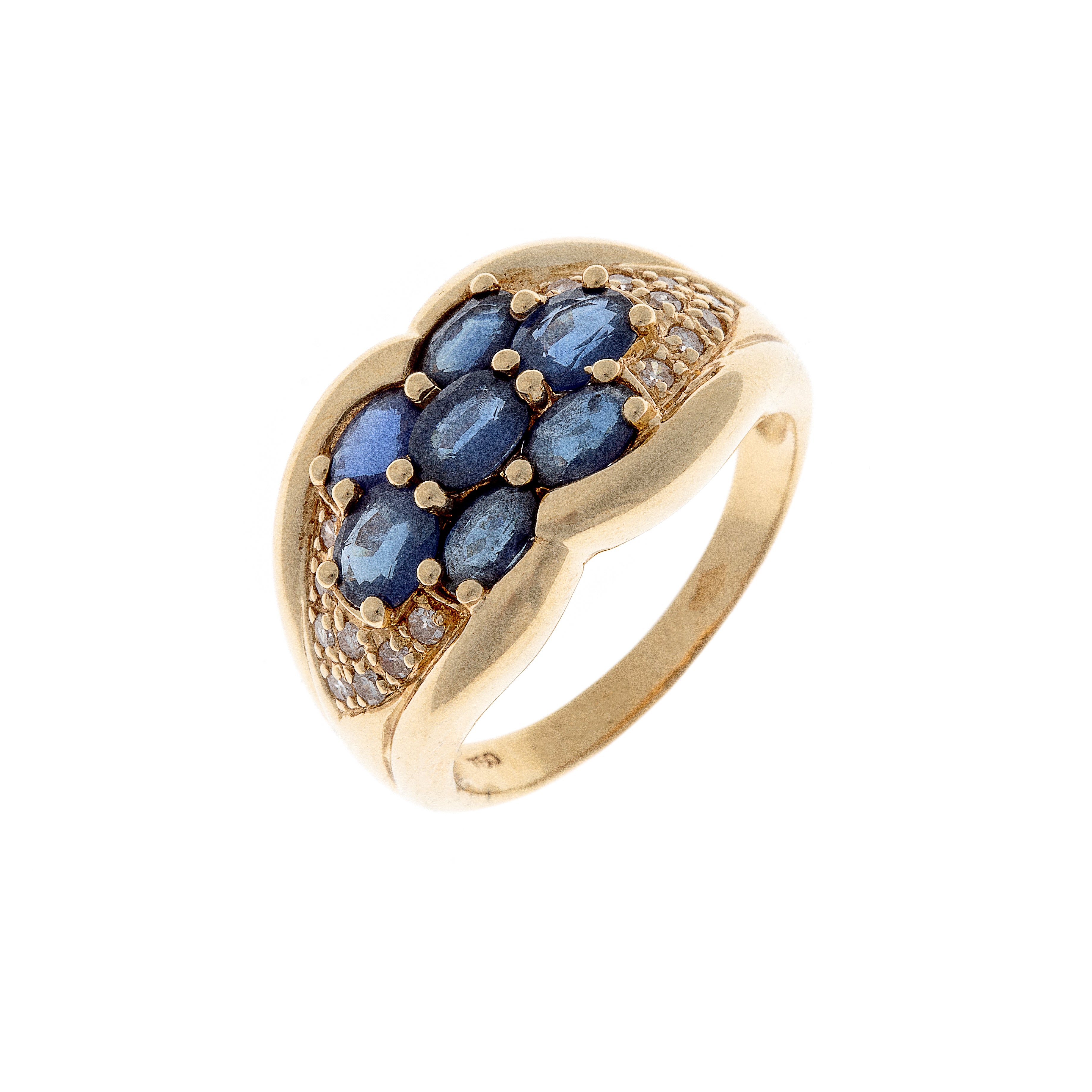 Angled view of vintage Belgian gold ring showing domed sapphire cluster surrounded by sparkling diamonds.