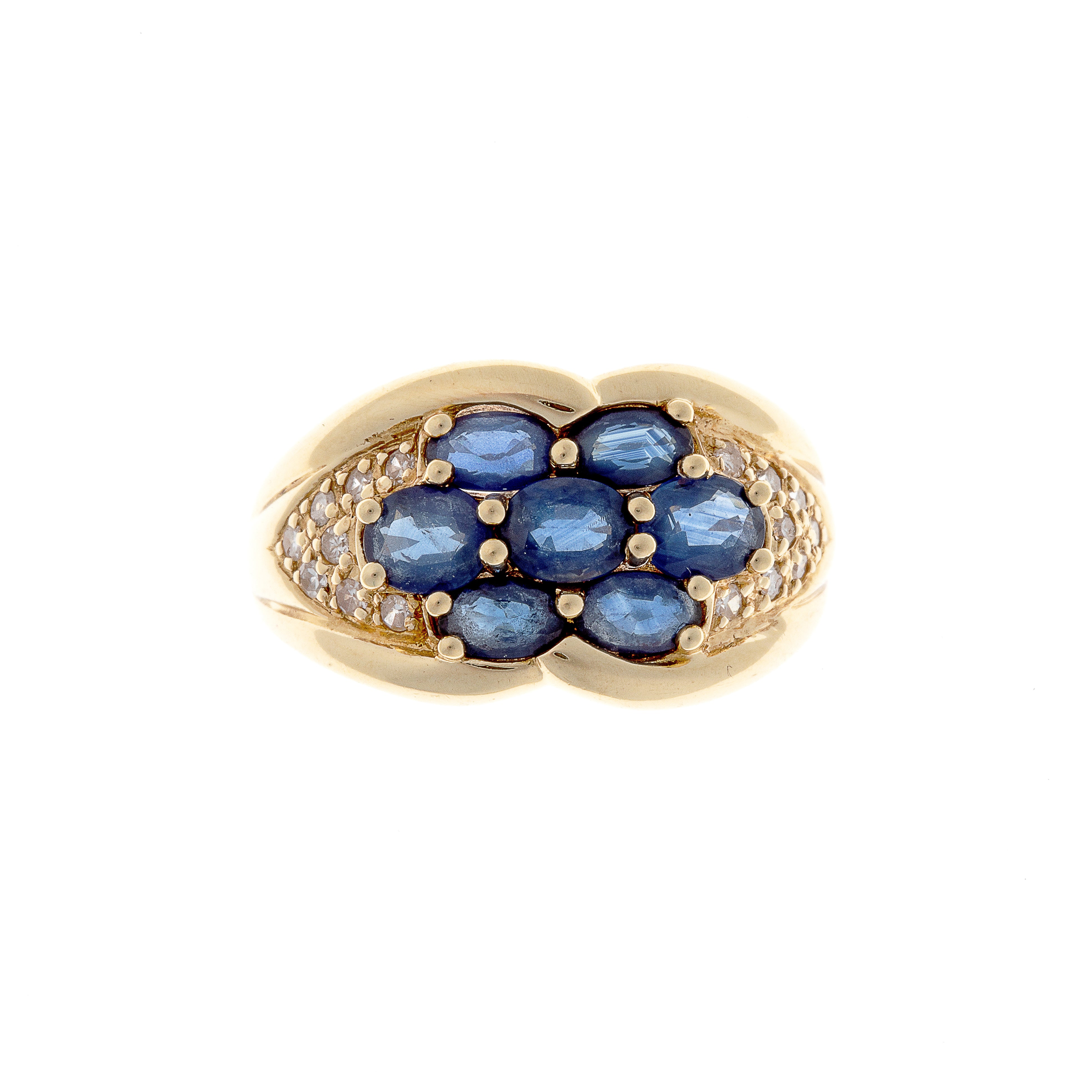 Vintage 18K gold cluster ring with blue sapphires and accent diamonds in an Art Deco floral-inspired design.
