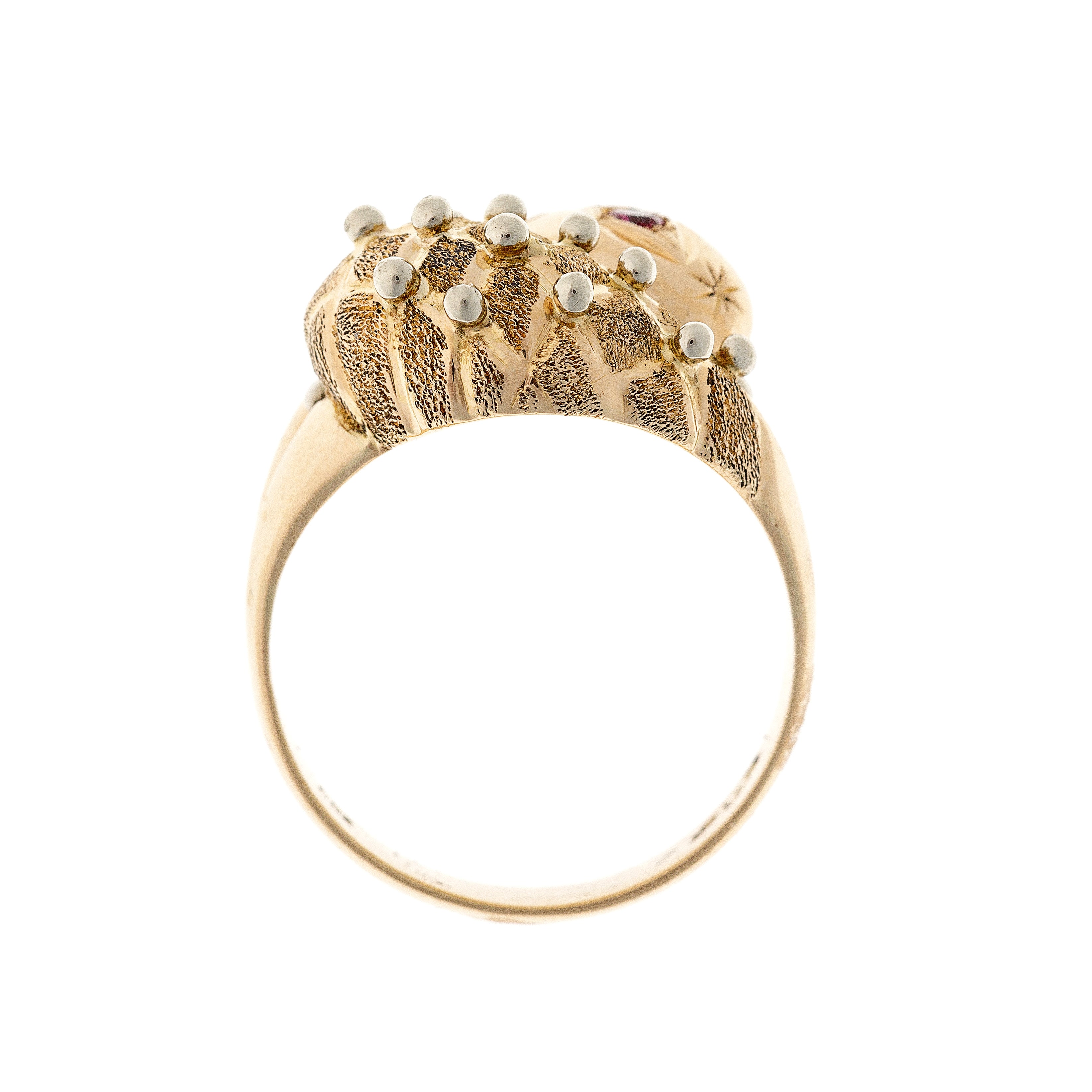 Front view of the gold snake ring, emphasizing the finely detailed metalwork and sculpted serpent motif.