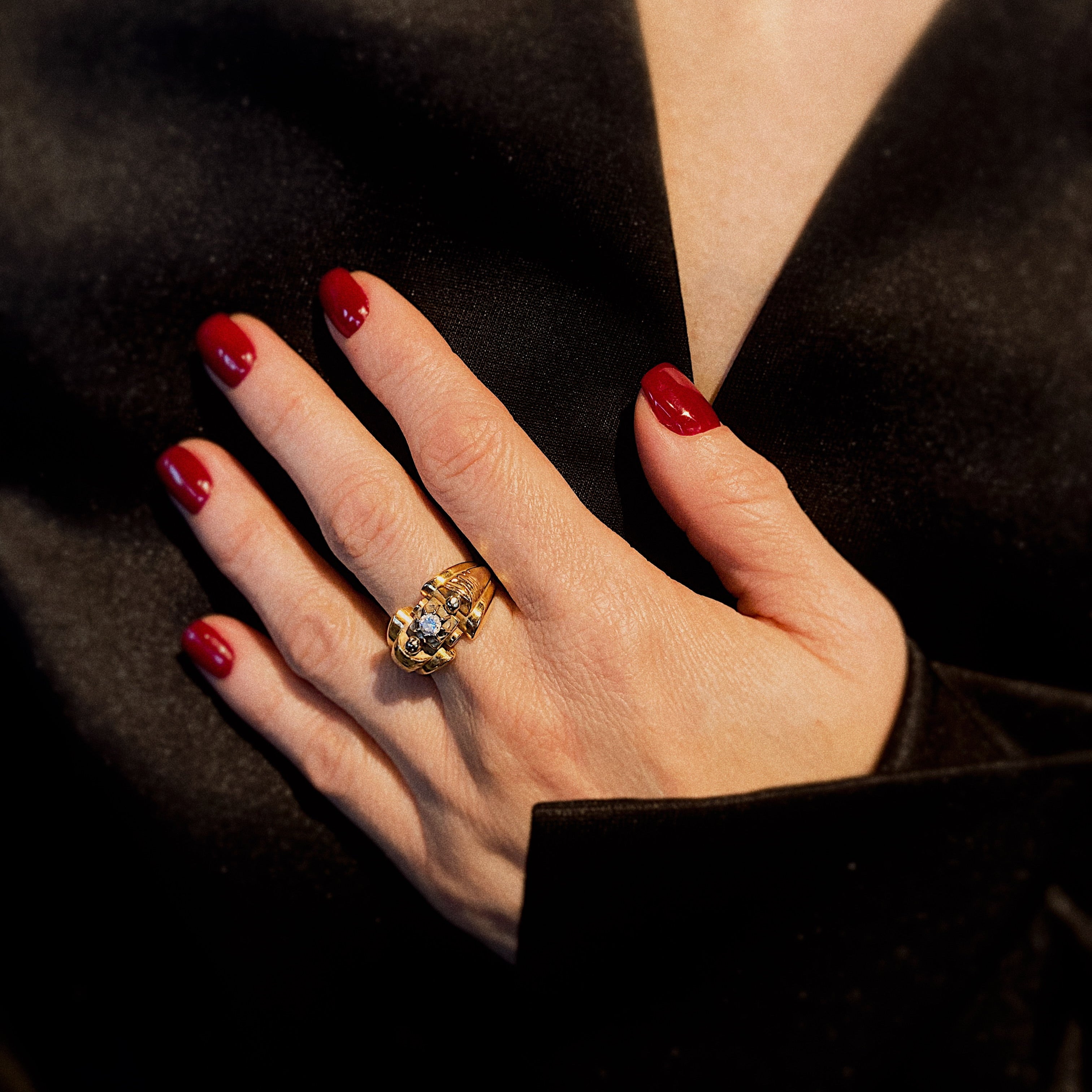 Model wearing the vintage gold cocktail ring with cubic zirconia.