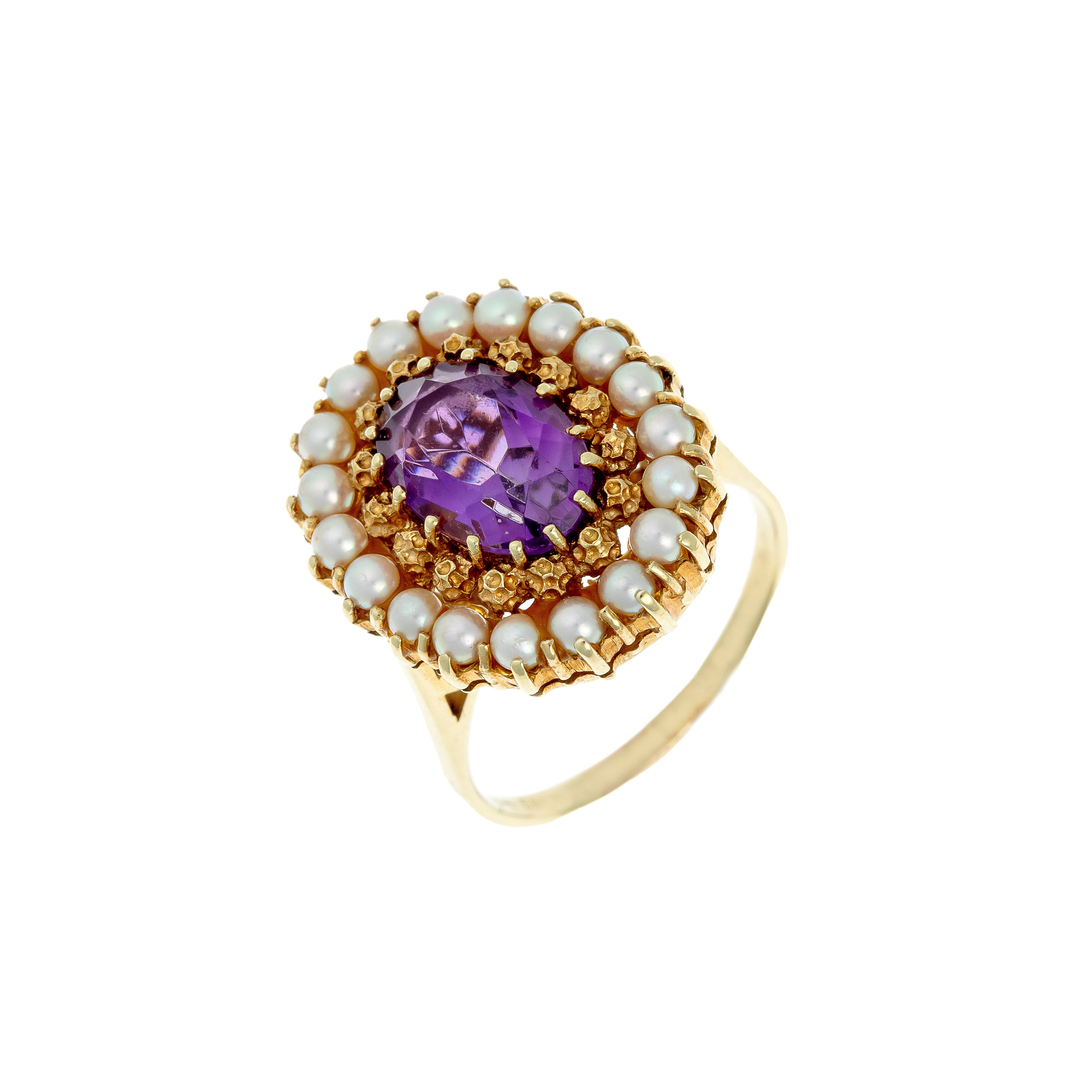 Vintage mid-century gold cocktail ring with amethyst and pearl halo.