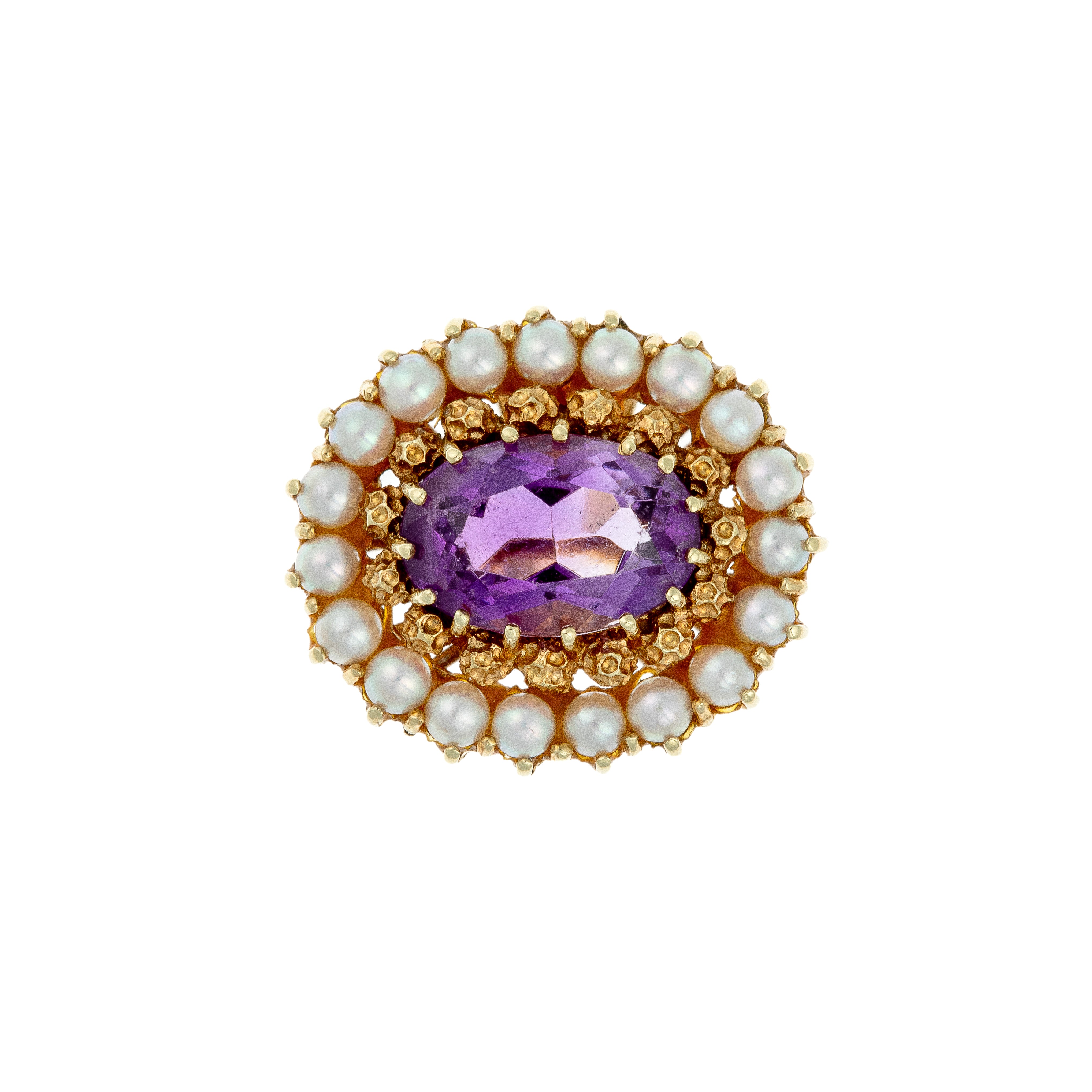 Top view of vintage gold cocktail ring with oval amethyst framed by pearls.
