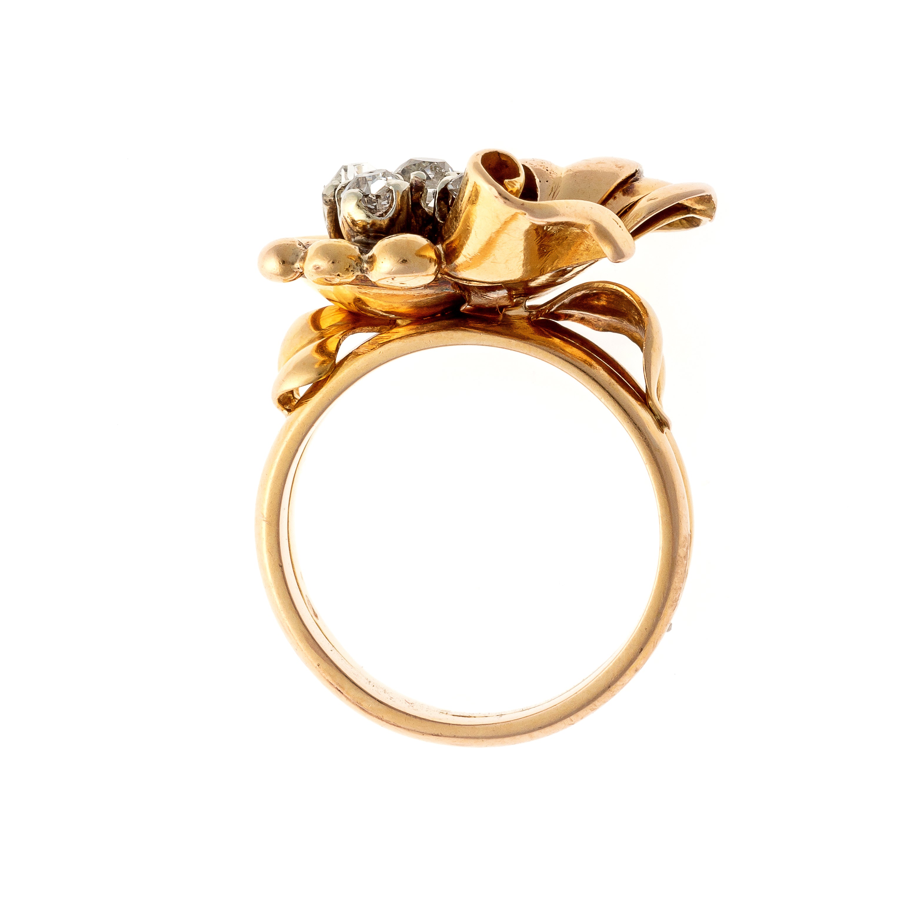 Profile of the Retro 1940s gold and diamond floral cocktail ring.