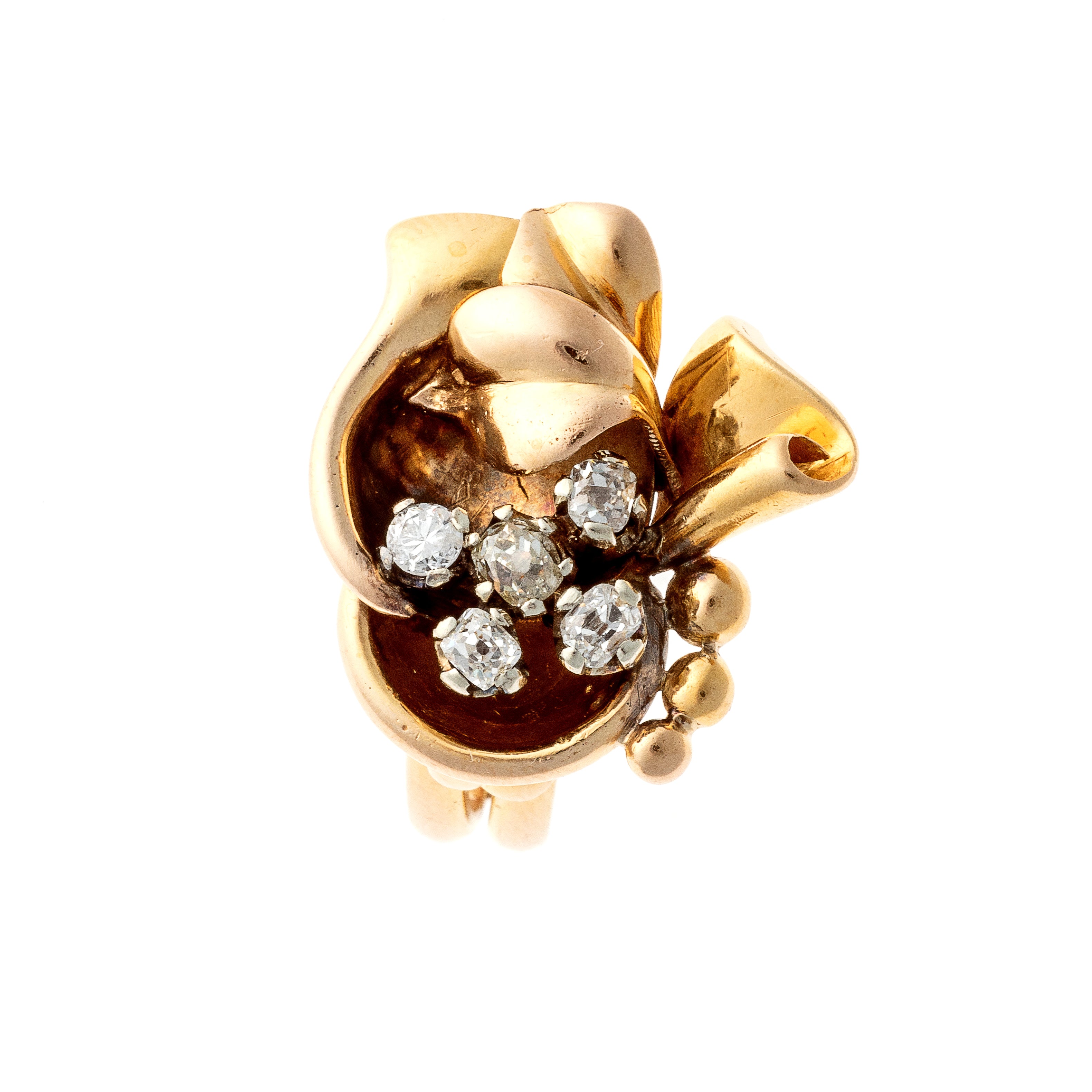Top of the Retro 1940s gold and diamond floral cocktail ring.
