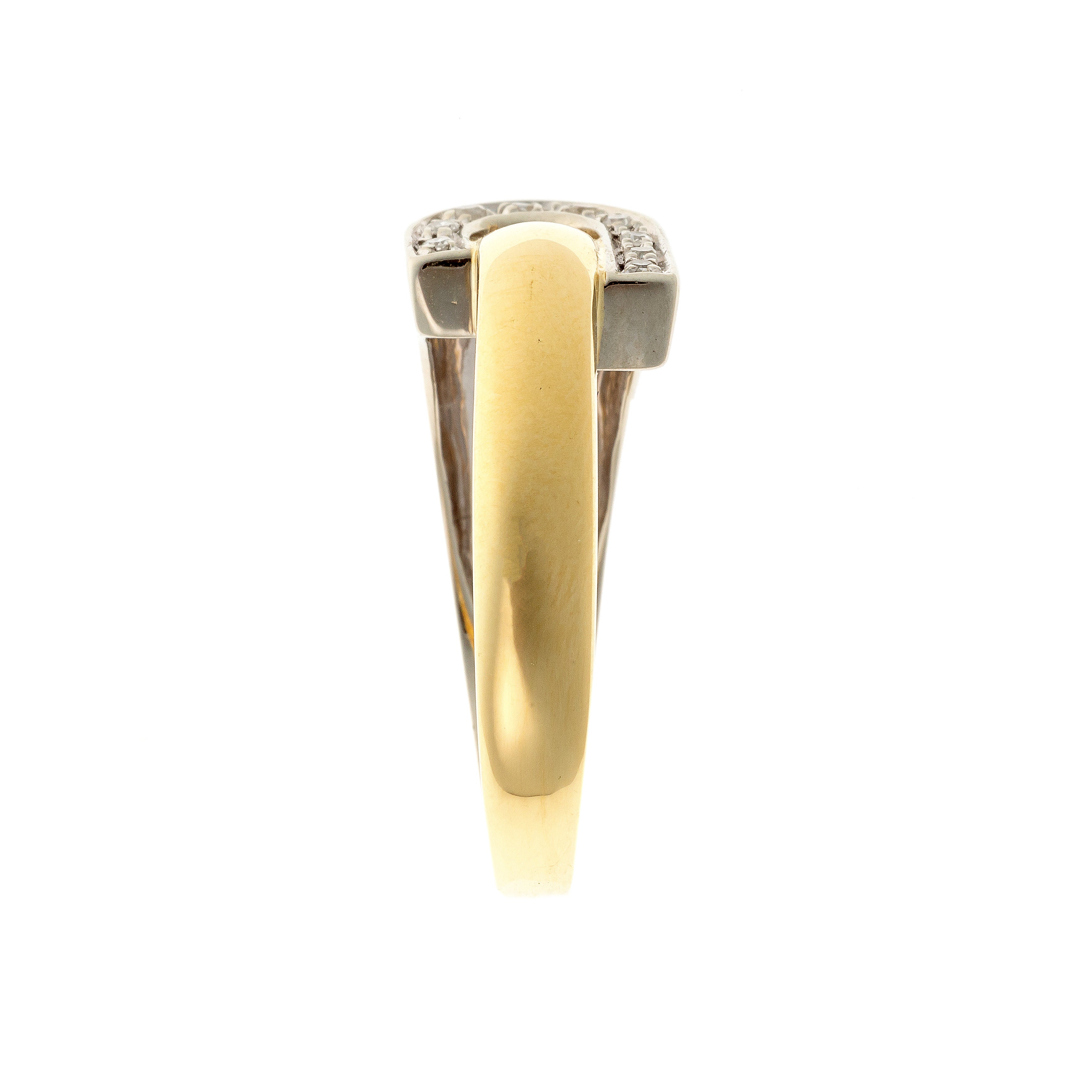 Side view of Retro sculptural two-tone gold ring highlighting diamond-set detail.