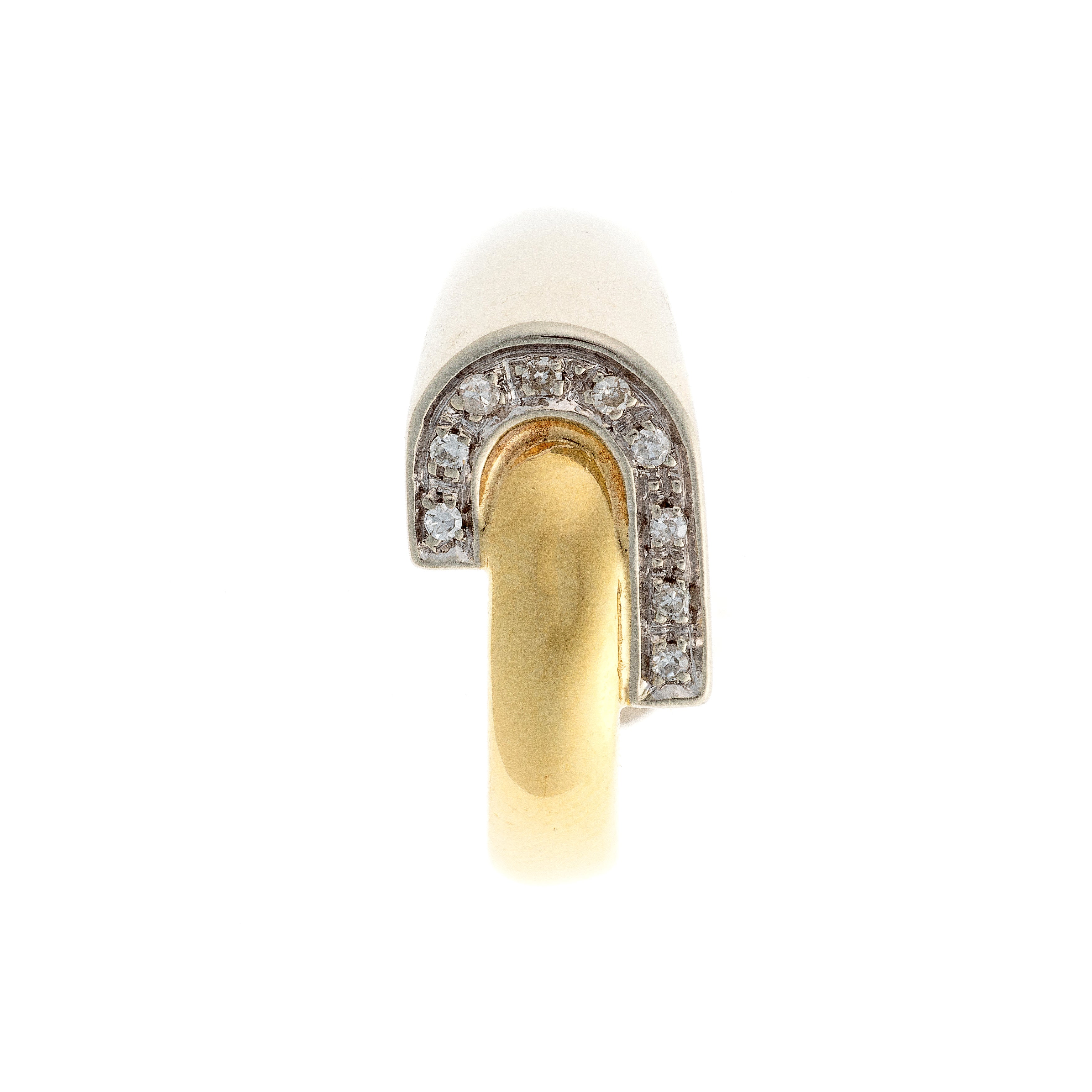 Top view of Retro gold ring with nine round diamonds set in white gold curve.