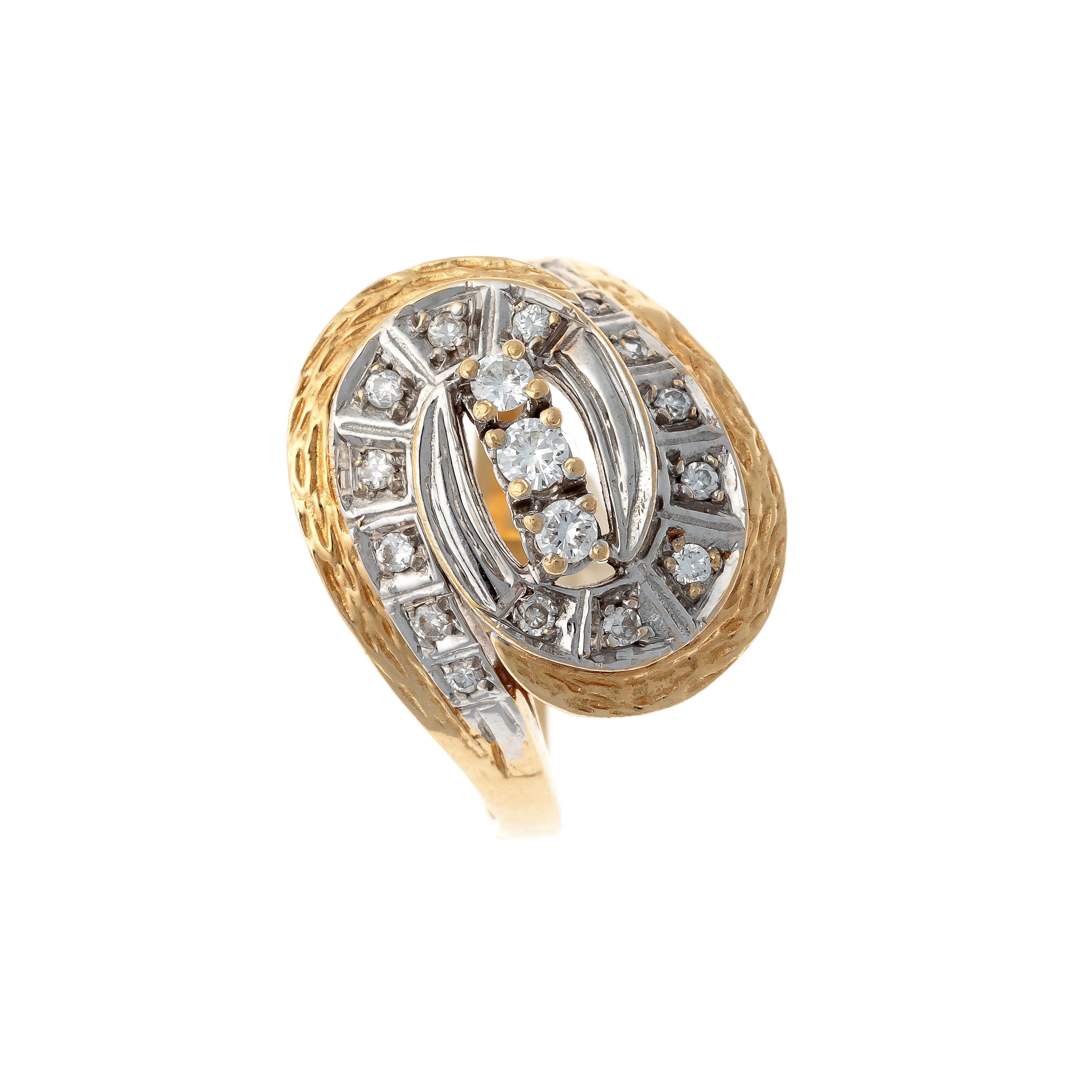 Top of the Retro two-tone gold textured diamond swirl cocktail ring.