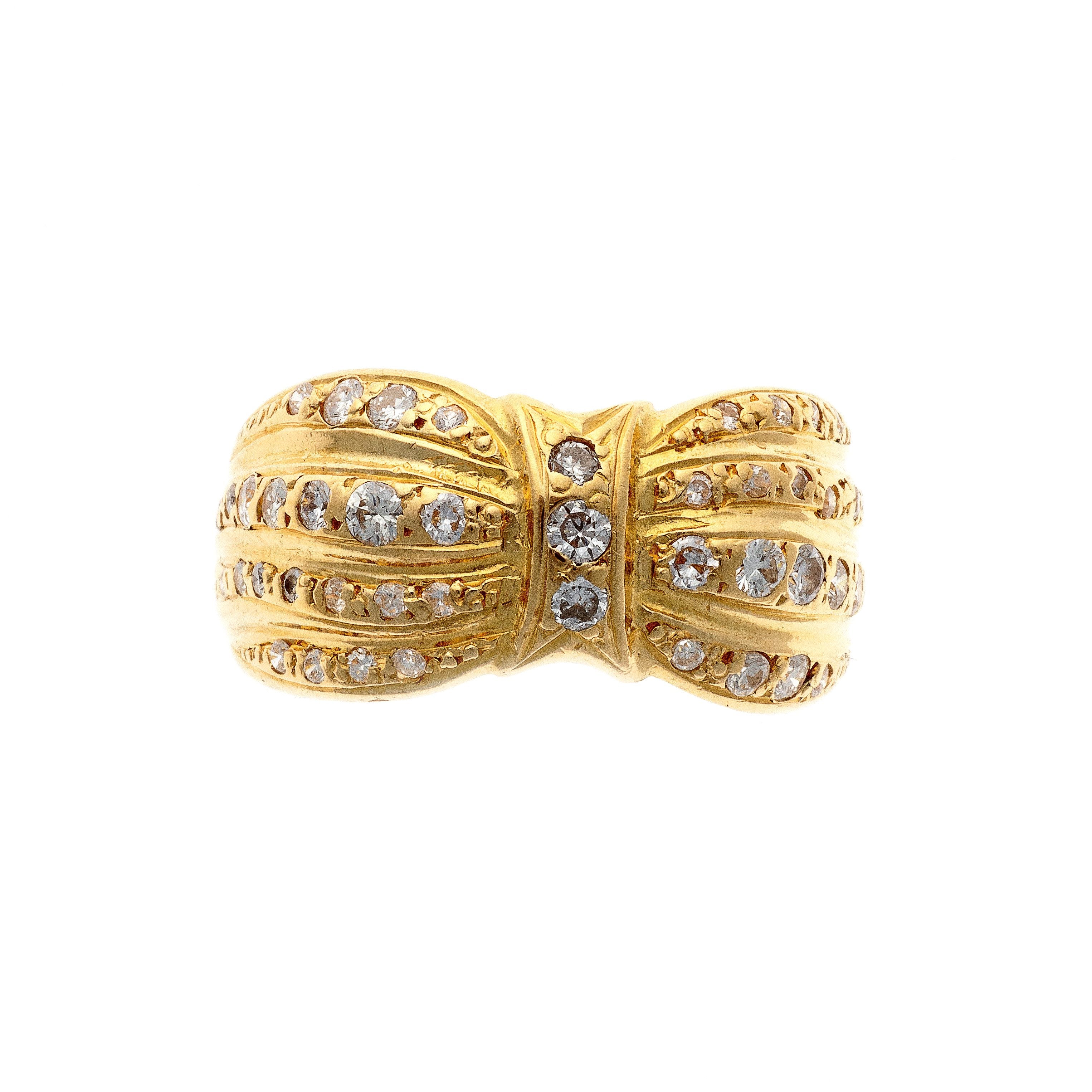 Top of the Retro yellow gold diamond bow cocktail ring.