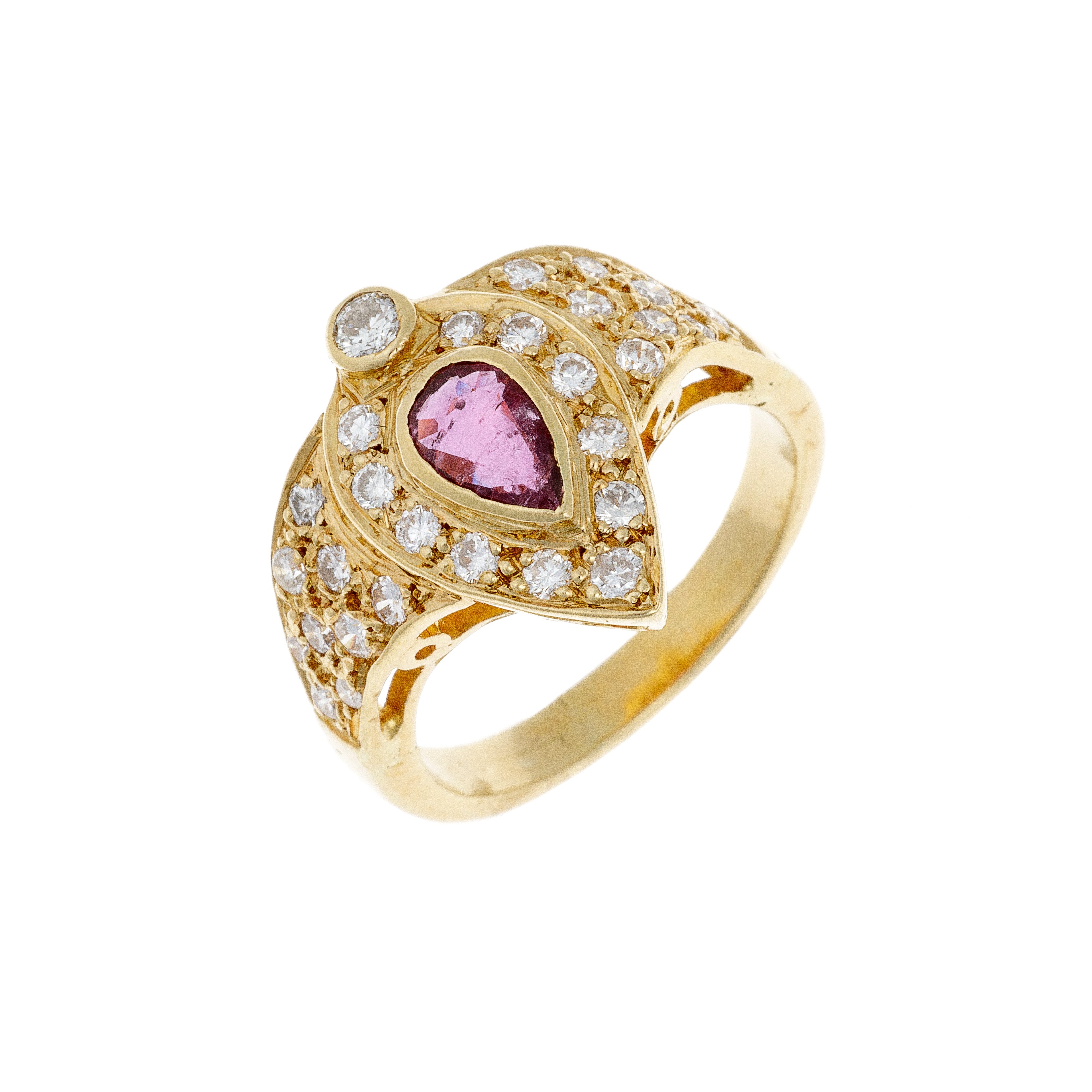 Angled view of vintage ruby and diamond halo gold ring showing brilliance and depth.