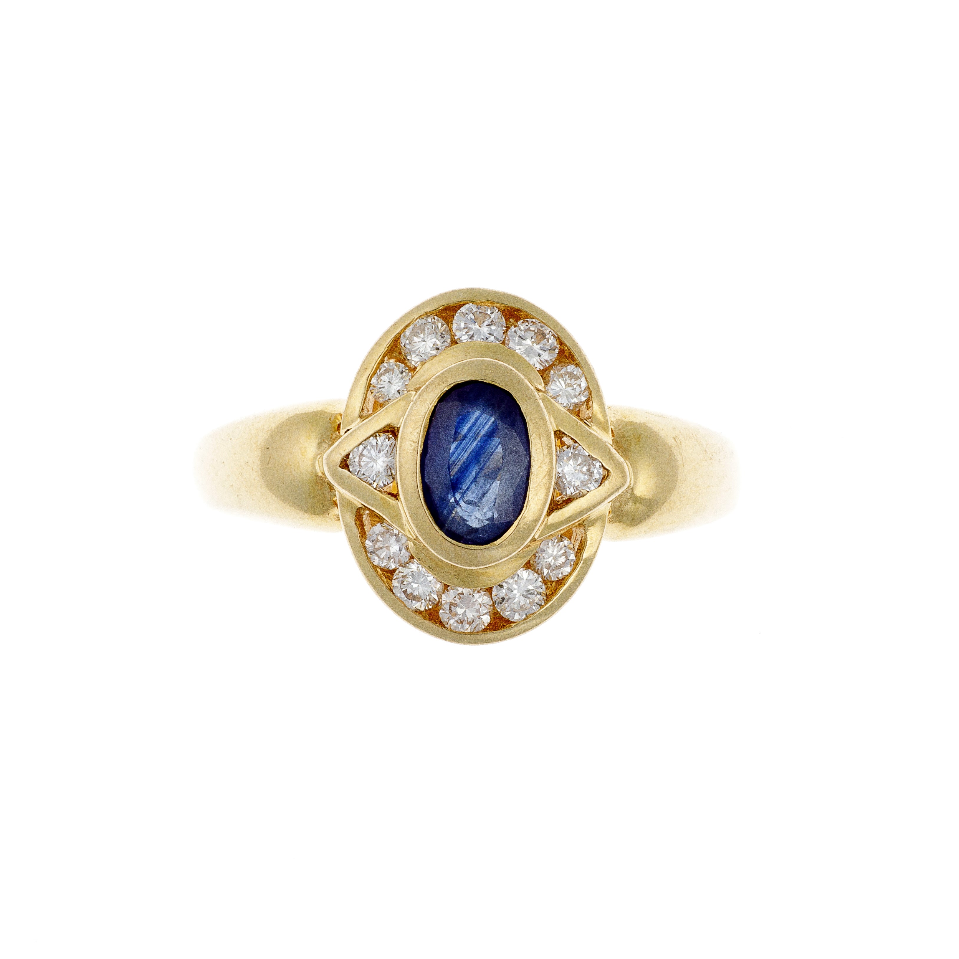 Front view of gold ring with oval sapphire and surrounding diamonds.
