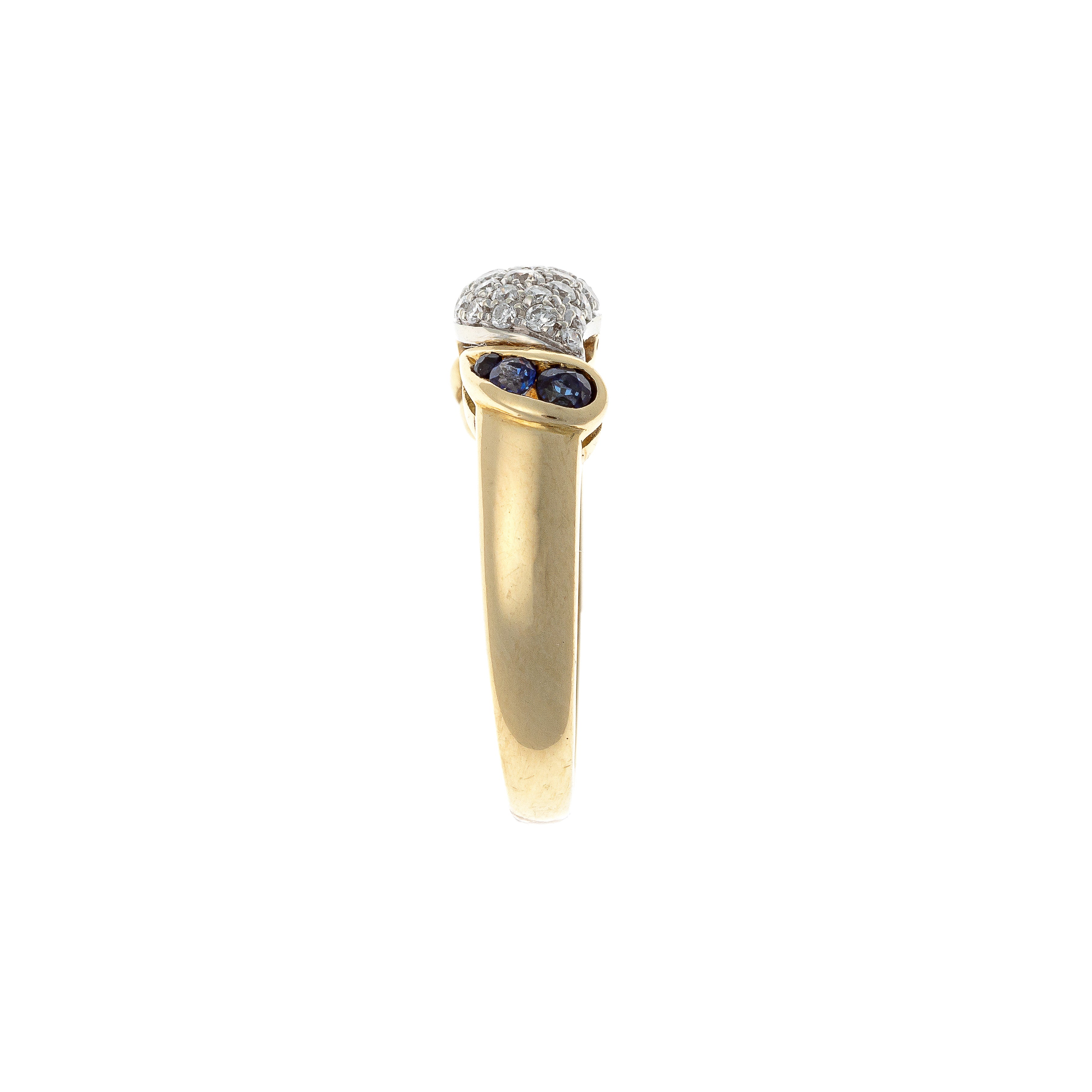 Side of the vintage two-tone gold diamond and sapphire domed cocktail ring.